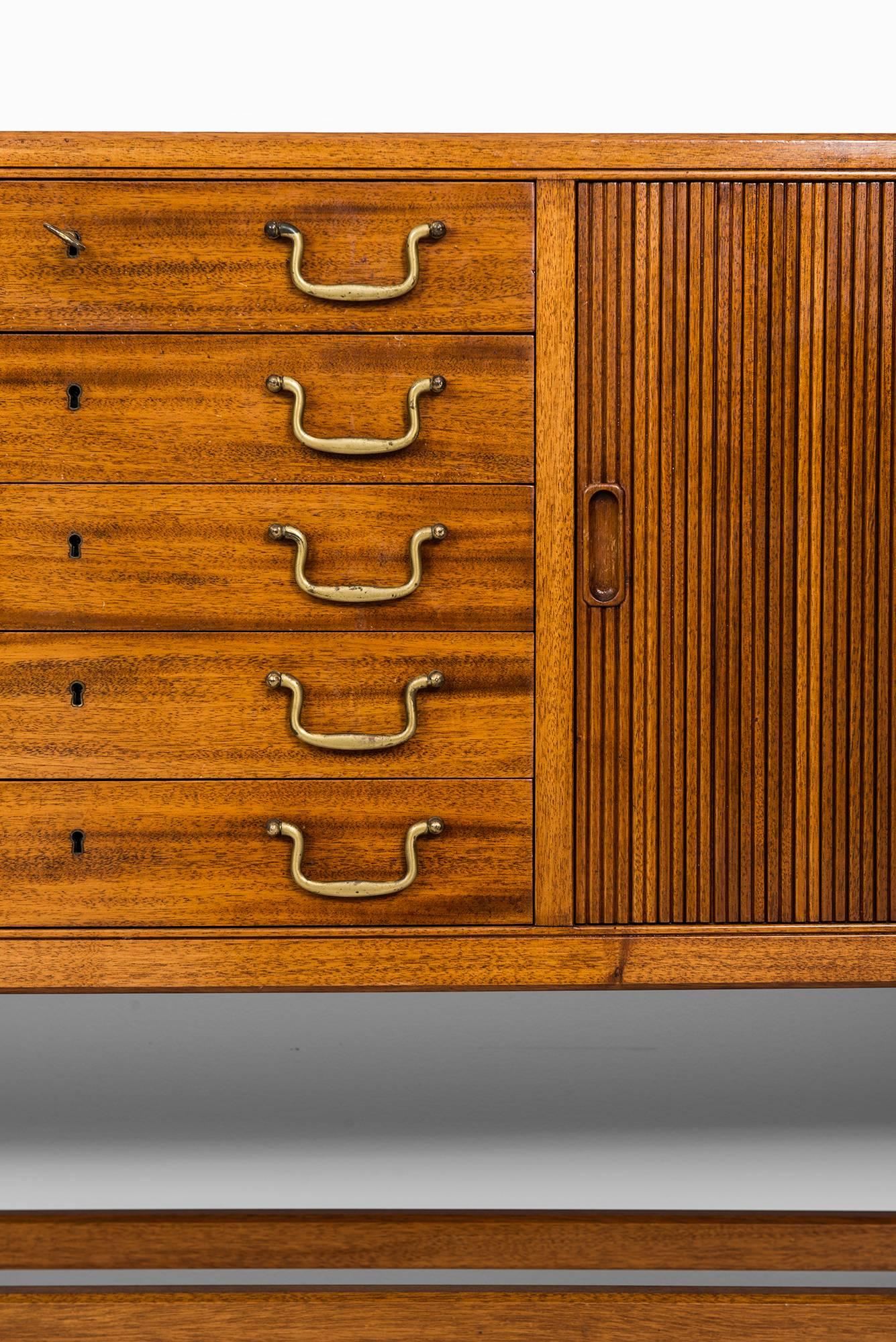 Rare cabinet or sideboard designed by David Rosén. Produced by Nordiska Kompaniet in Sweden.