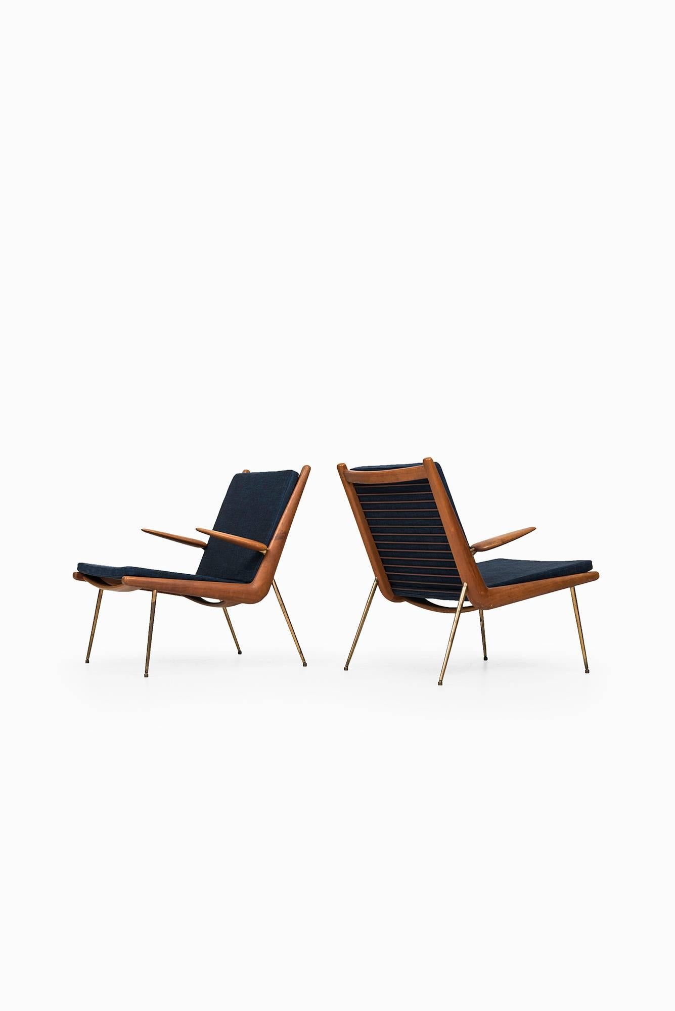 Rare pair of easy chairs model FD-134 / Boomerang designed by Peter Hvidt & Orla Mølgaard-Nielsen. Produced by France & Son in Denmark.