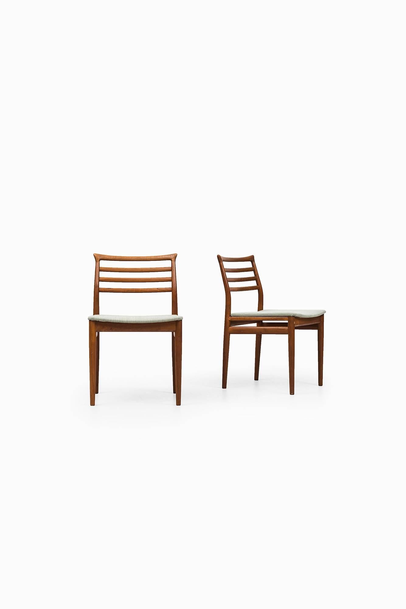 Rare set of eight dining chairs designed by Erling Torvits. Produced by Soro Stolefabrik in Denmark.