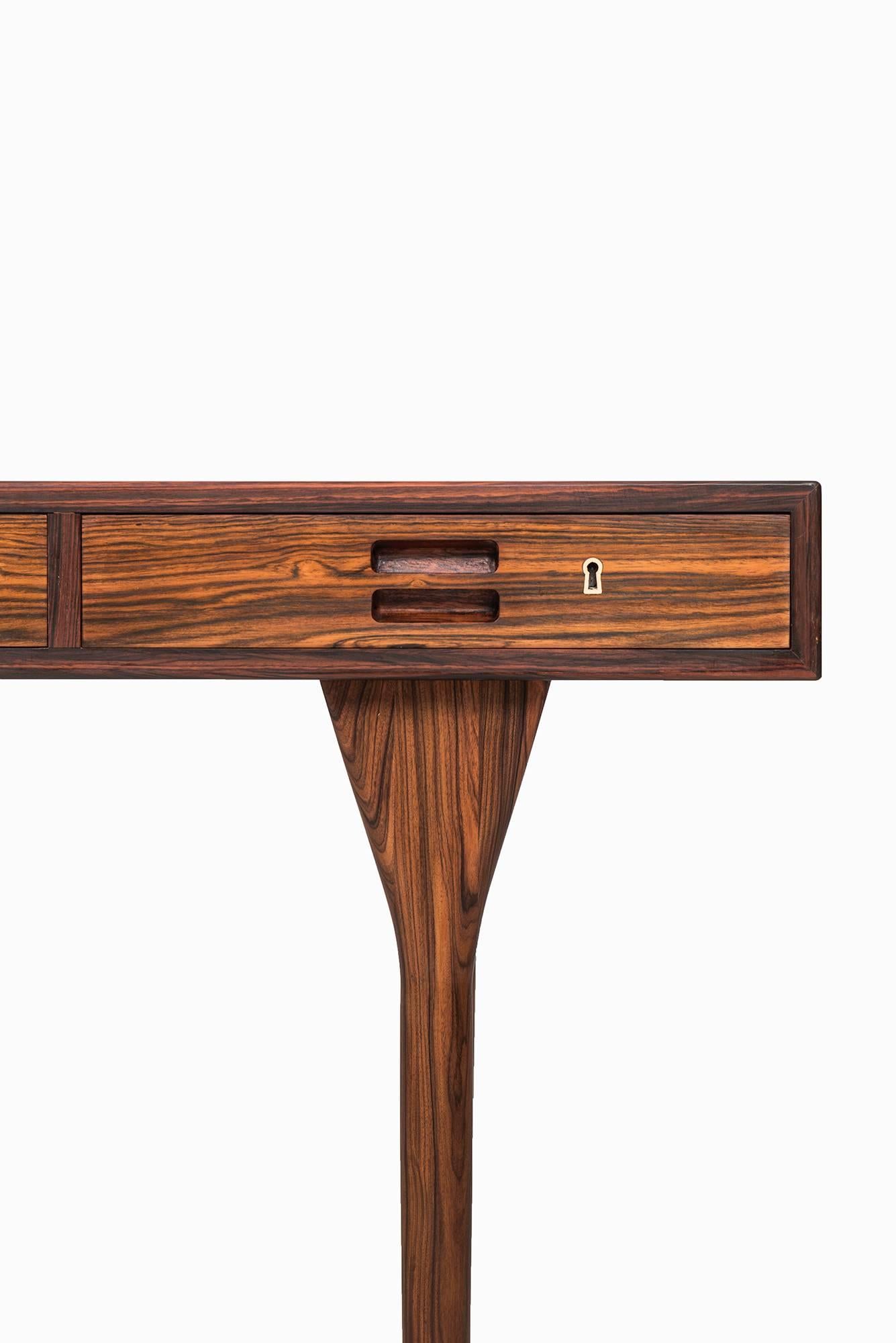 Rare freestanding desk in rosewood designed by Nanna Ditzel. Produced by Søren Willadsen in Denmark.