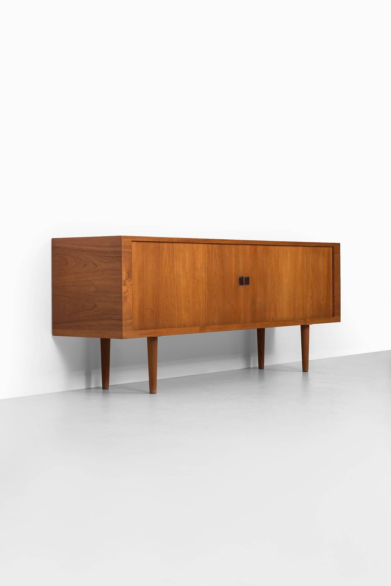 Rare sideboard model RY-25 / President designed by Hans Wegner. Produced by Ry Møbler in Denmark.