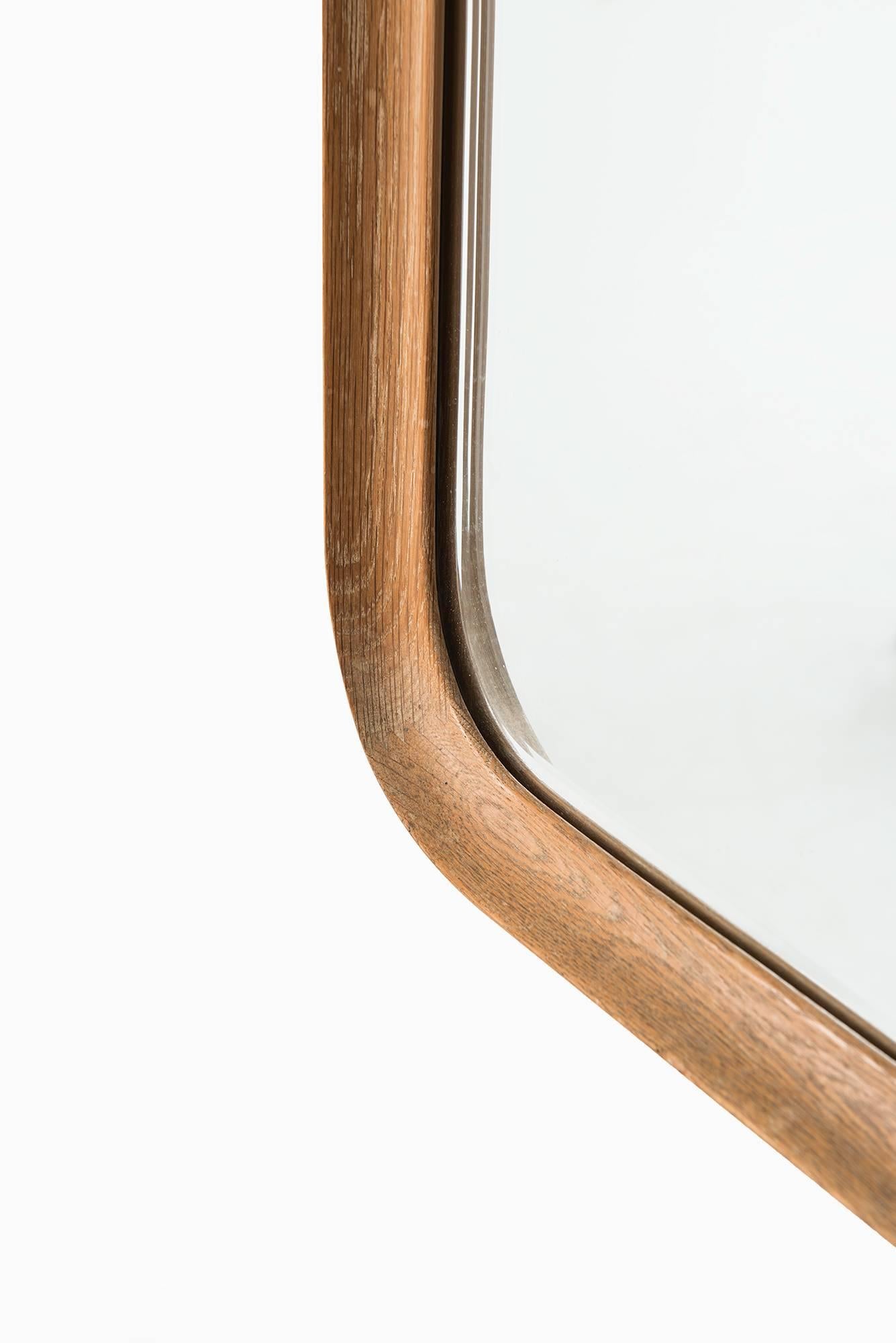Mirror in whitewashed oak produced by Fröseke, AB Nybrofabriken in Sweden.