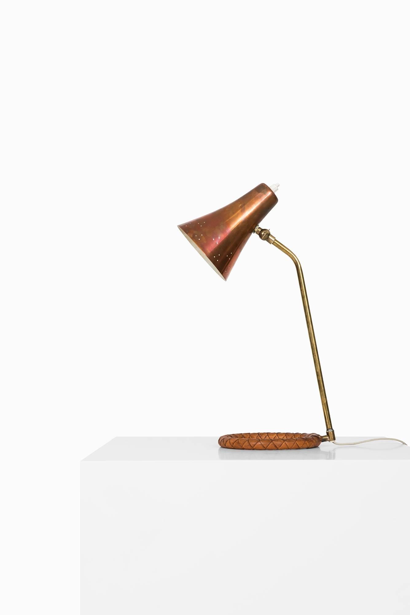 Rare table lamp in the manner of Hans Bergström. Produced in Sweden.