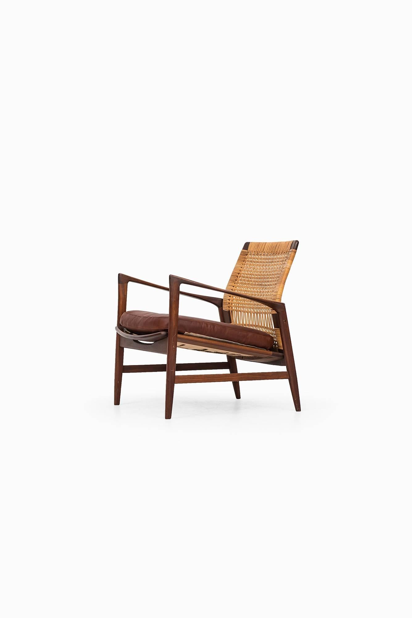 Rare easy chair model Åre designed by Ib Kofod-Larsen. Produced by OPE in Sweden.