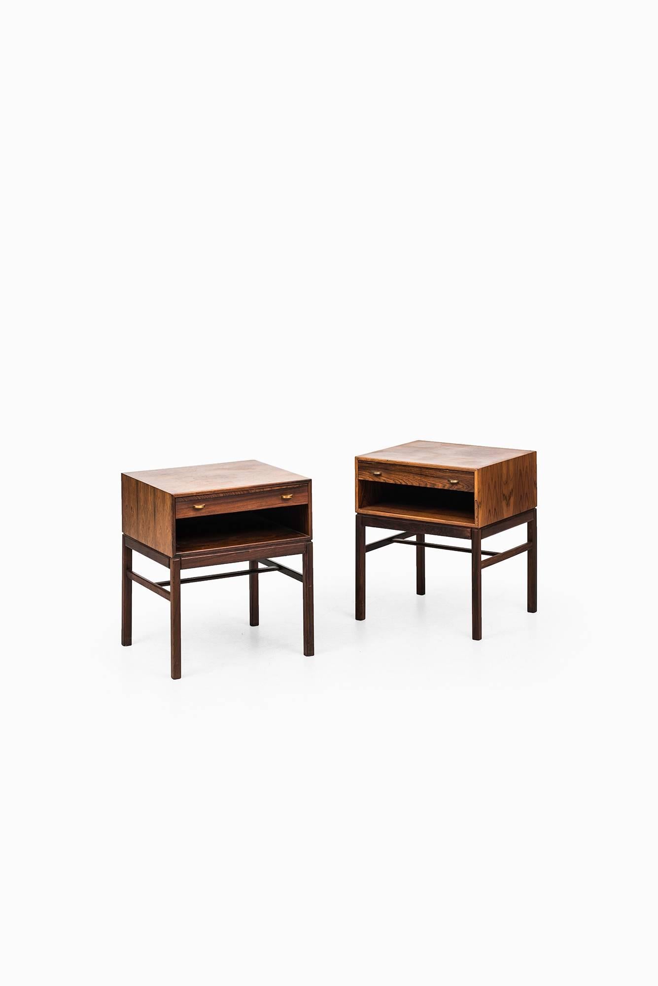 A pair of bedside tables model casino designed by Sven Engström & Gunnar Myrstrand. Produced by Tingströms in Sweden.