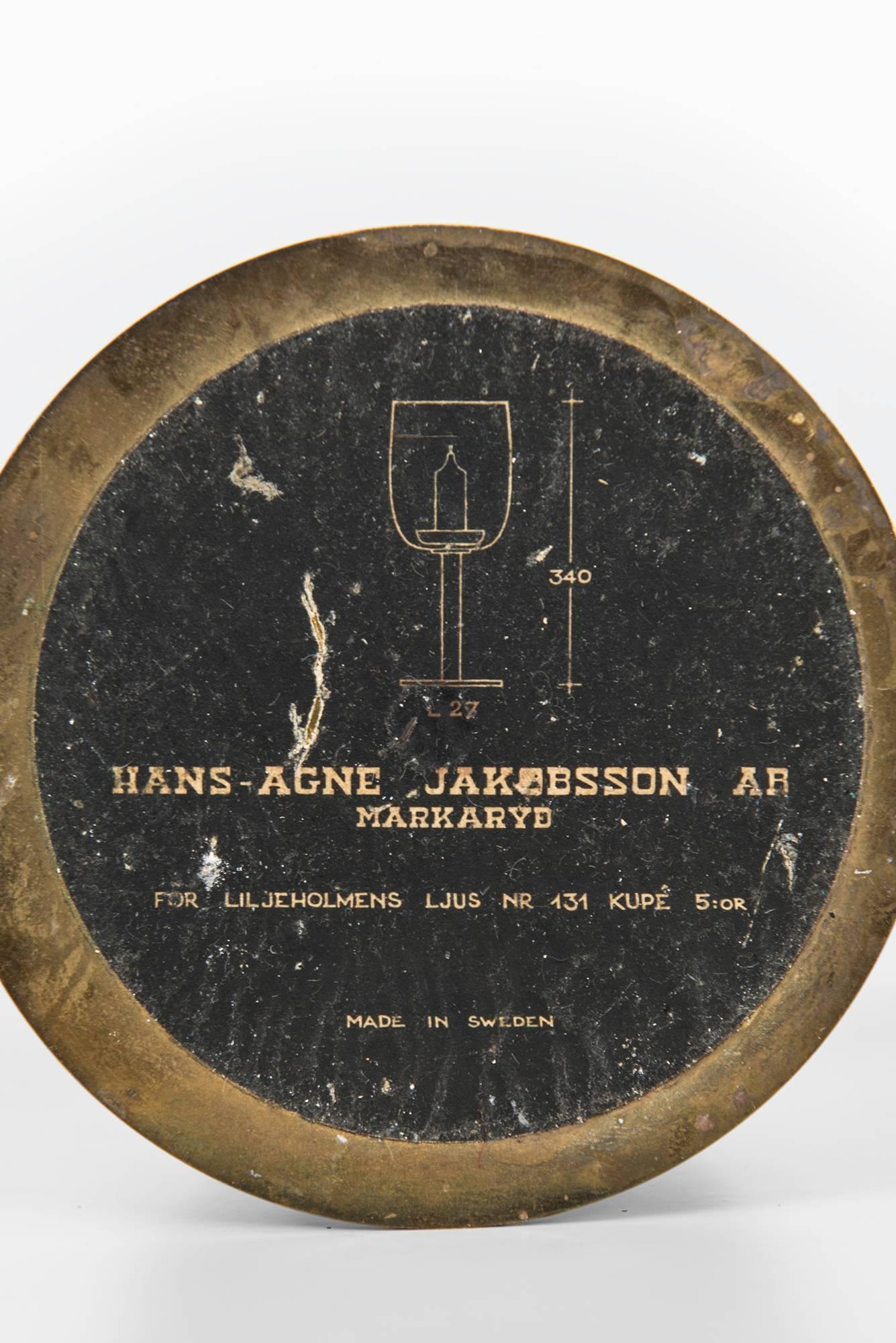 Hans-Agne Jakobsson Candlesticks in Brass and Glass (Schwedisch)