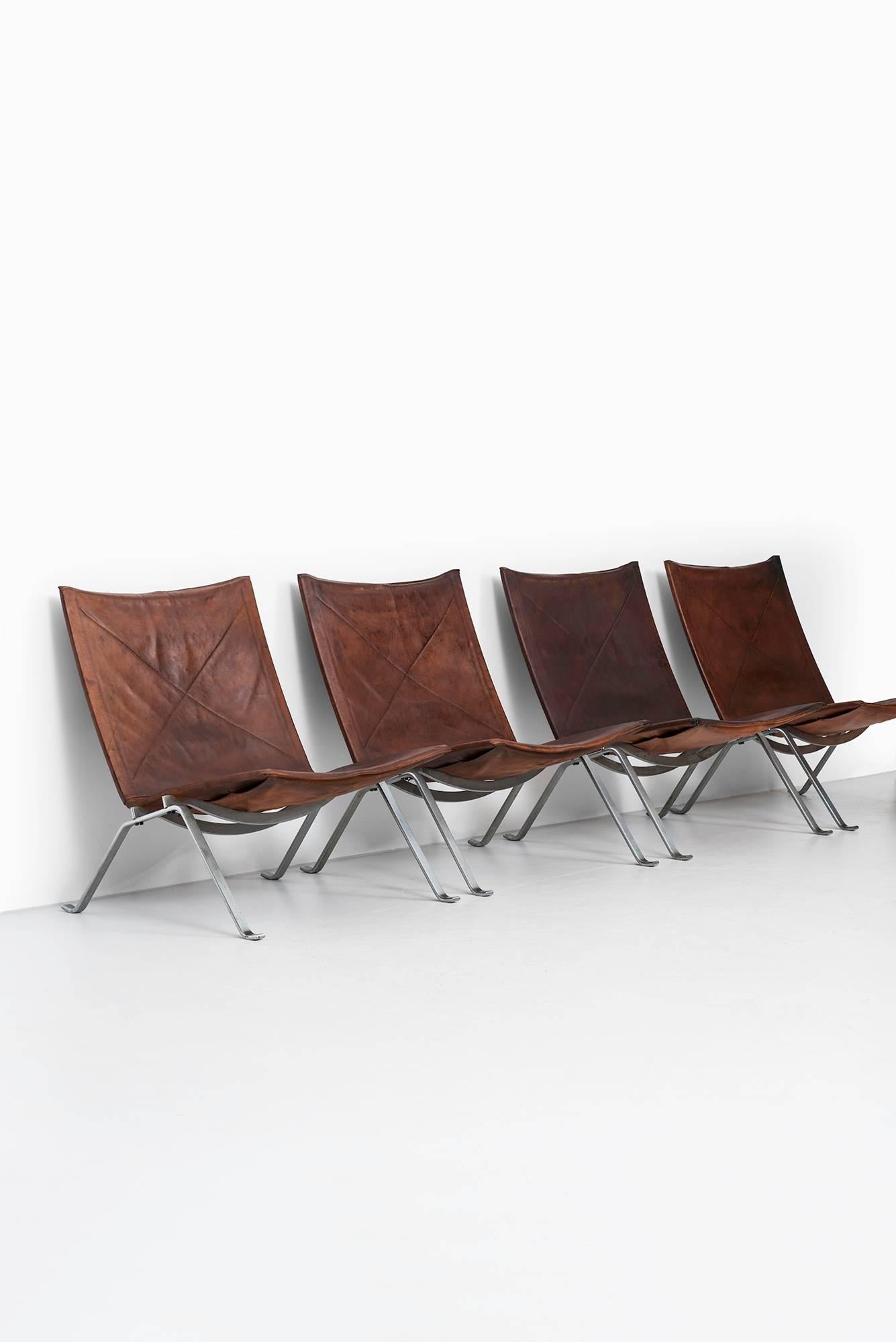Rare set of four easy chairs model PK-22 designed by Poul Kjærholm. Produced by E. Kold Christensen in Denmark.