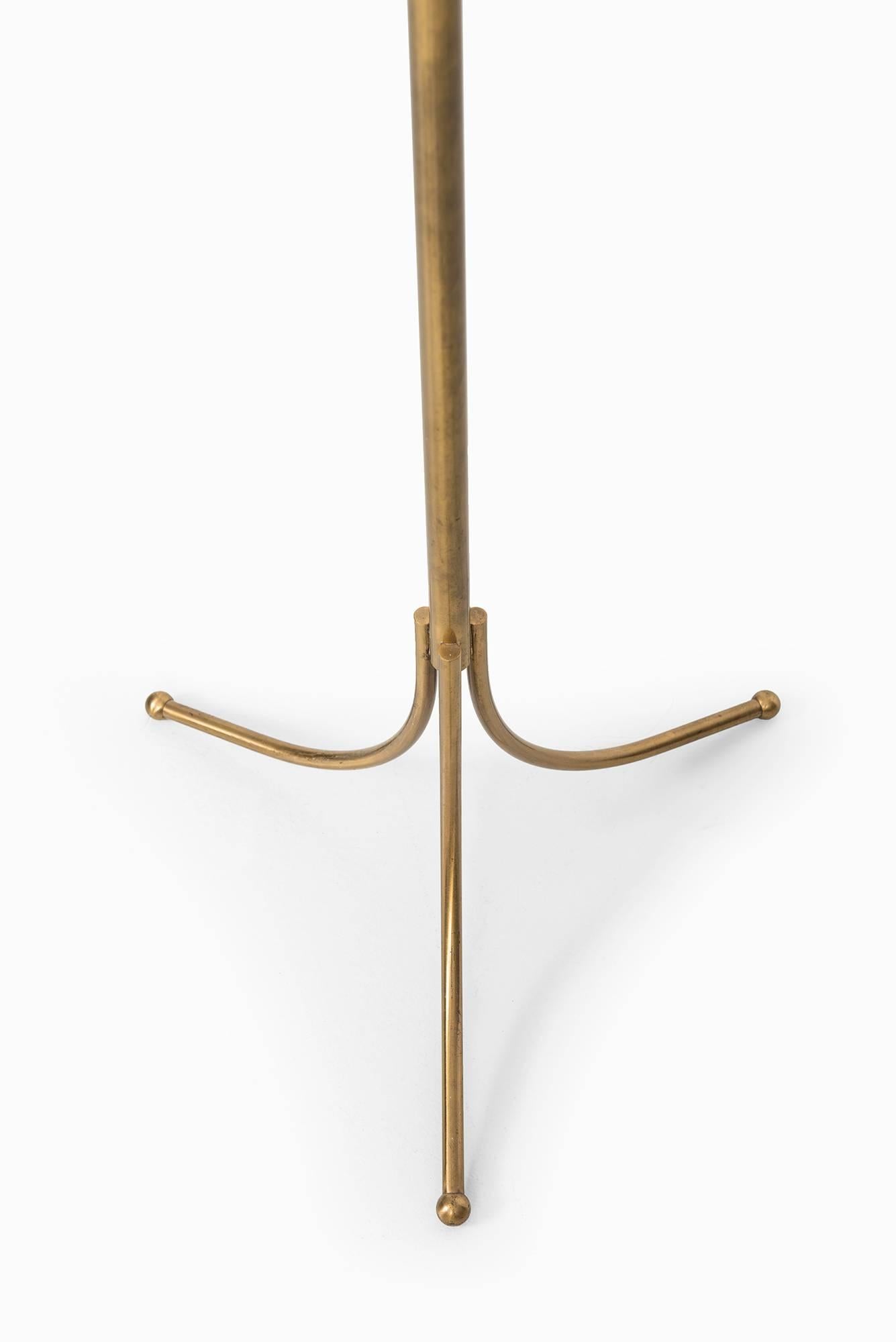 Height adjustable floor lamp model 1842 designed by Josef Frank. Produced by Svenskt Tenn in Sweden. Please note: This will be sold without any lamp shade.