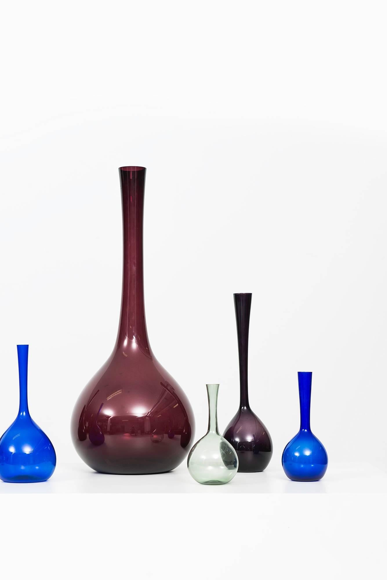 A set of seven glass vases designed by Arthur Percy. Produced by Gullaskruf in Sweden.