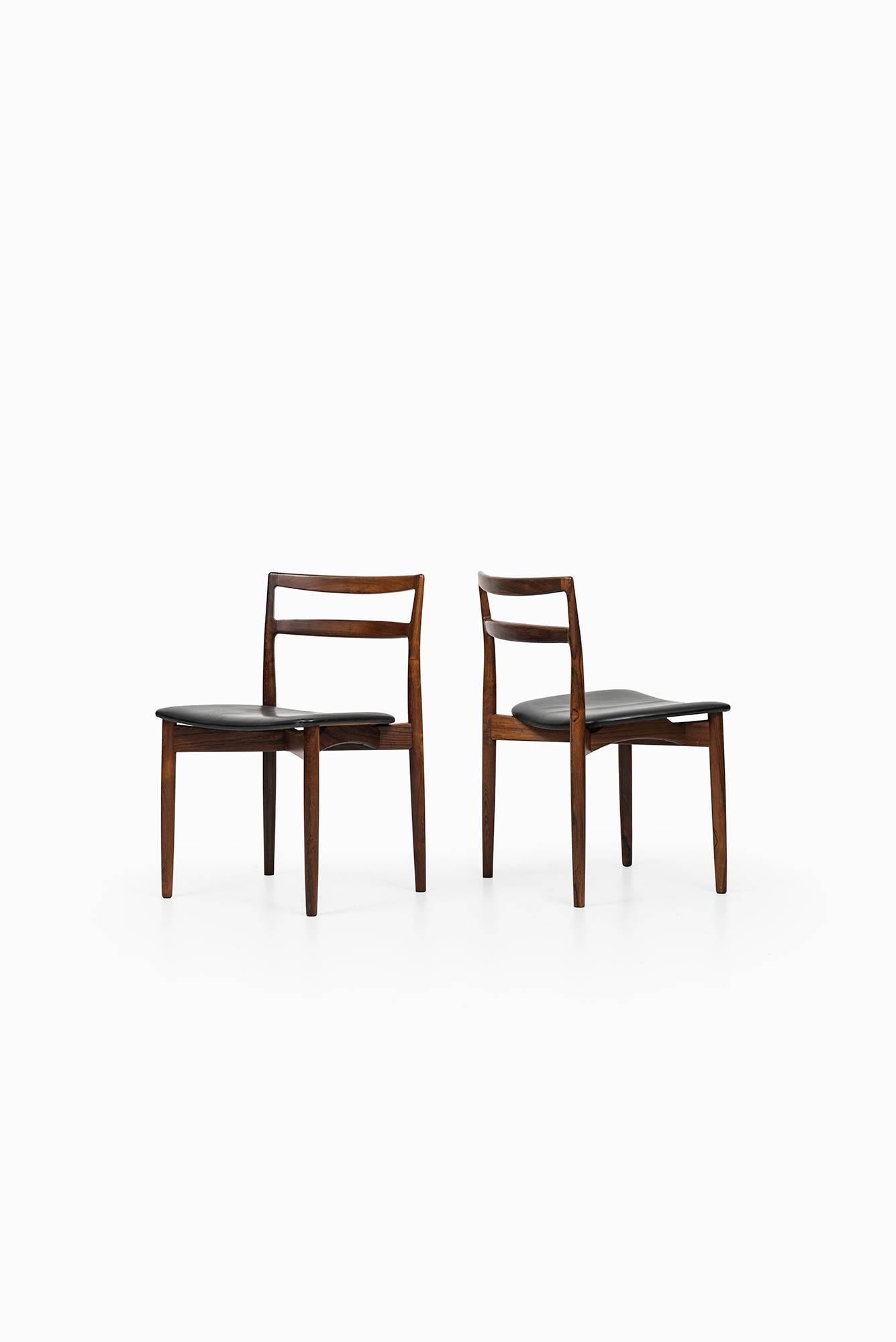 Rare set of eight dining chairs model 61 designed by Harry Østergaard. Produced by Randers møbelfabrik in Denmark.