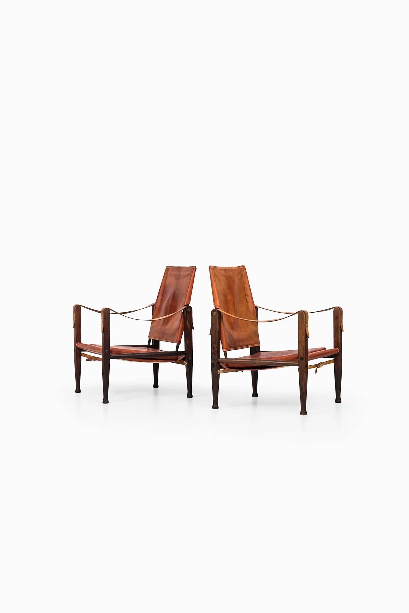 A rare pair of safari chairs designed by Kaare Klint. Produced by Rud Rasmussen in Denmark.