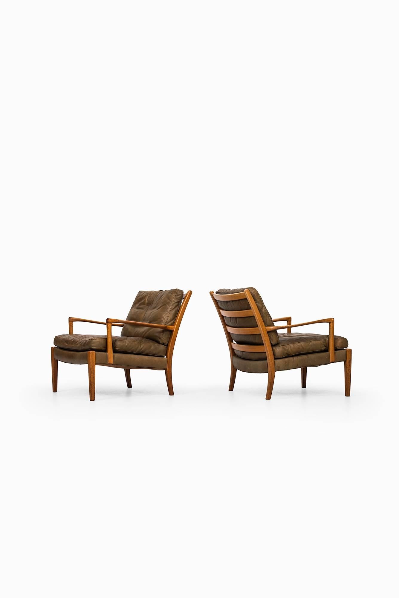 Rare pair of easy chairs model Löven designed by Arne Norell. Produced by Arne Norell AB in Aneby, Sweden.