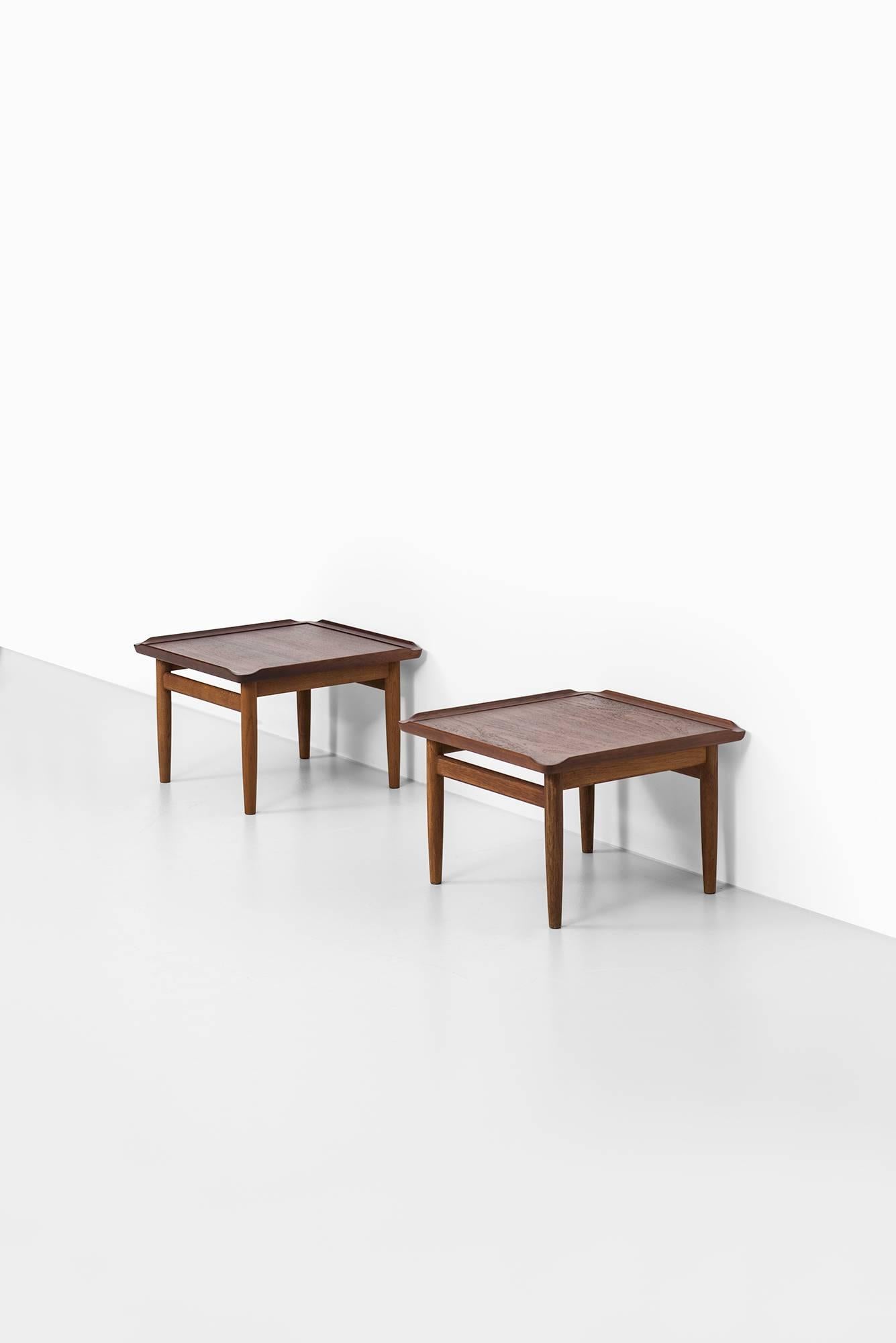 Rare pair of side tables designed by Kurt Ostervig. Produced by Jason Møbler in Denmark.