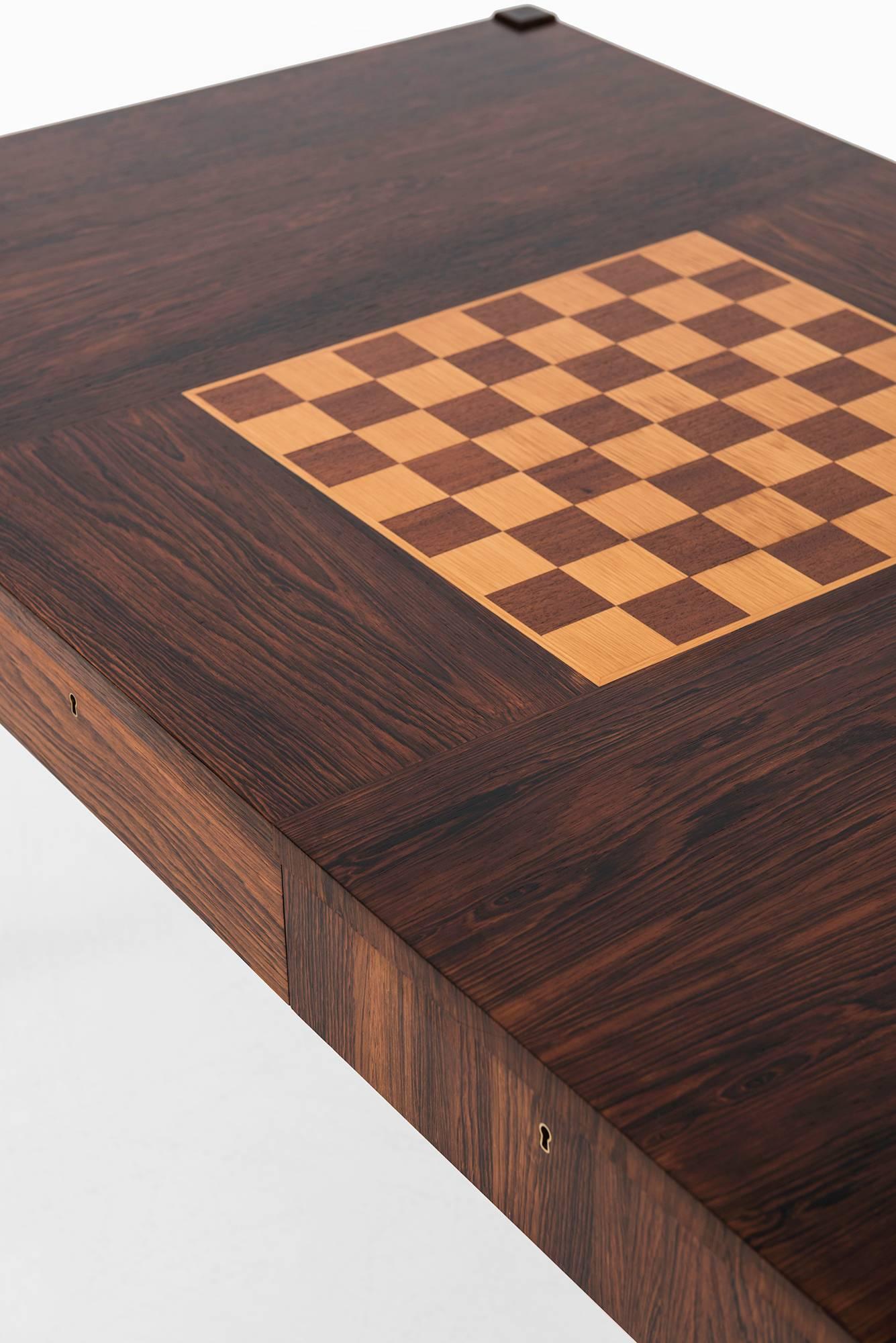 Very rare and most likely unique rosewood desk with chessboard on top. Produced in Sweden.