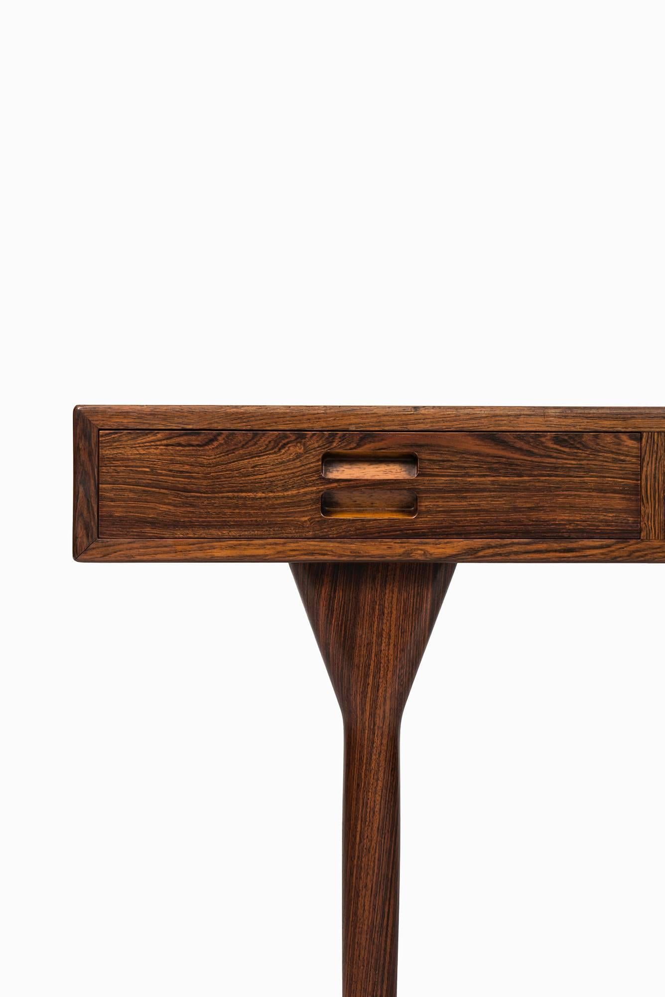 Rare freestanding desk in rosewood designed by Nanna Ditzel. Produced by Søren Willadsen in Denmark.