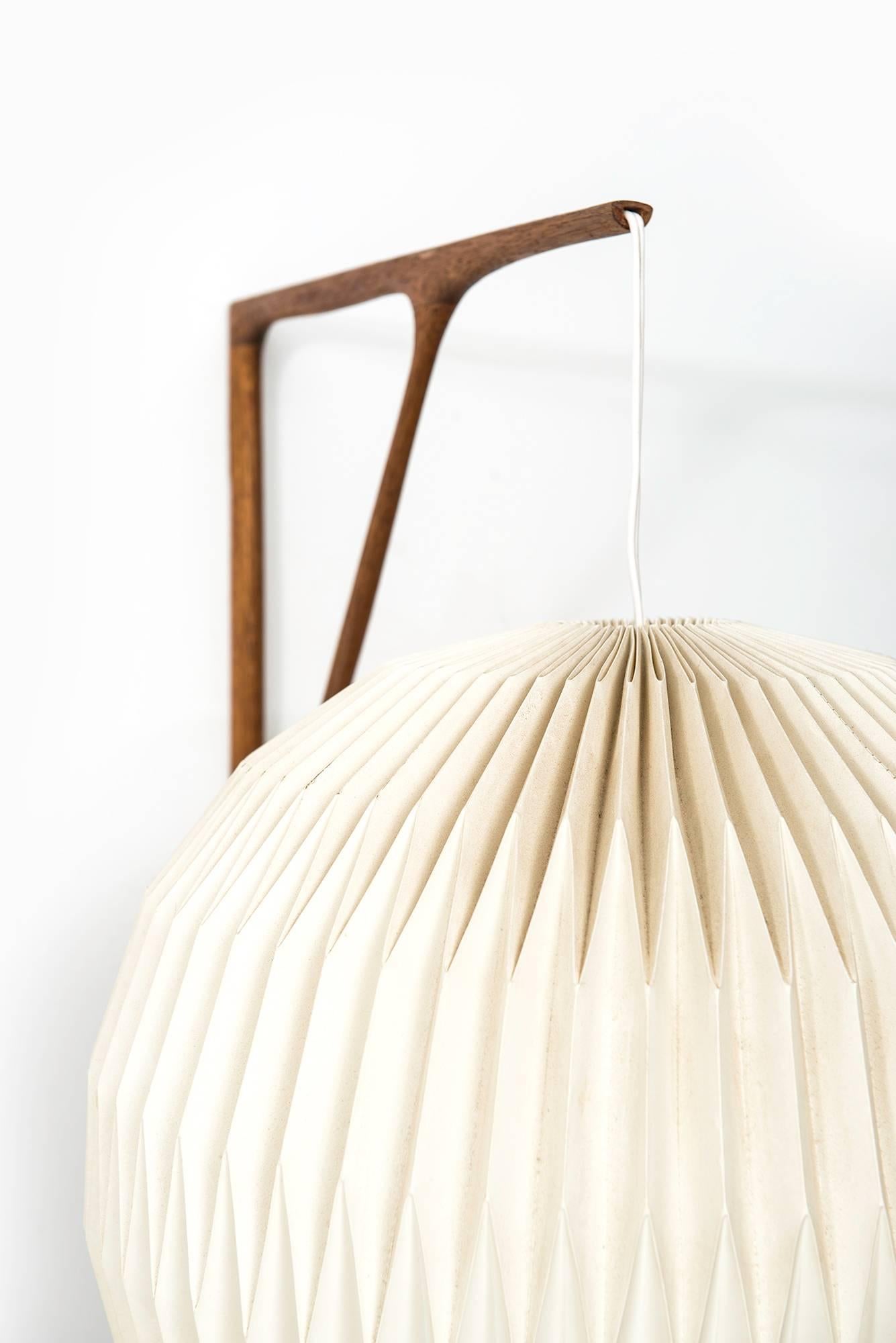 Mid-20th Century Sculptural Wall Lamp in Teak with Lamp Shade by Le Klint