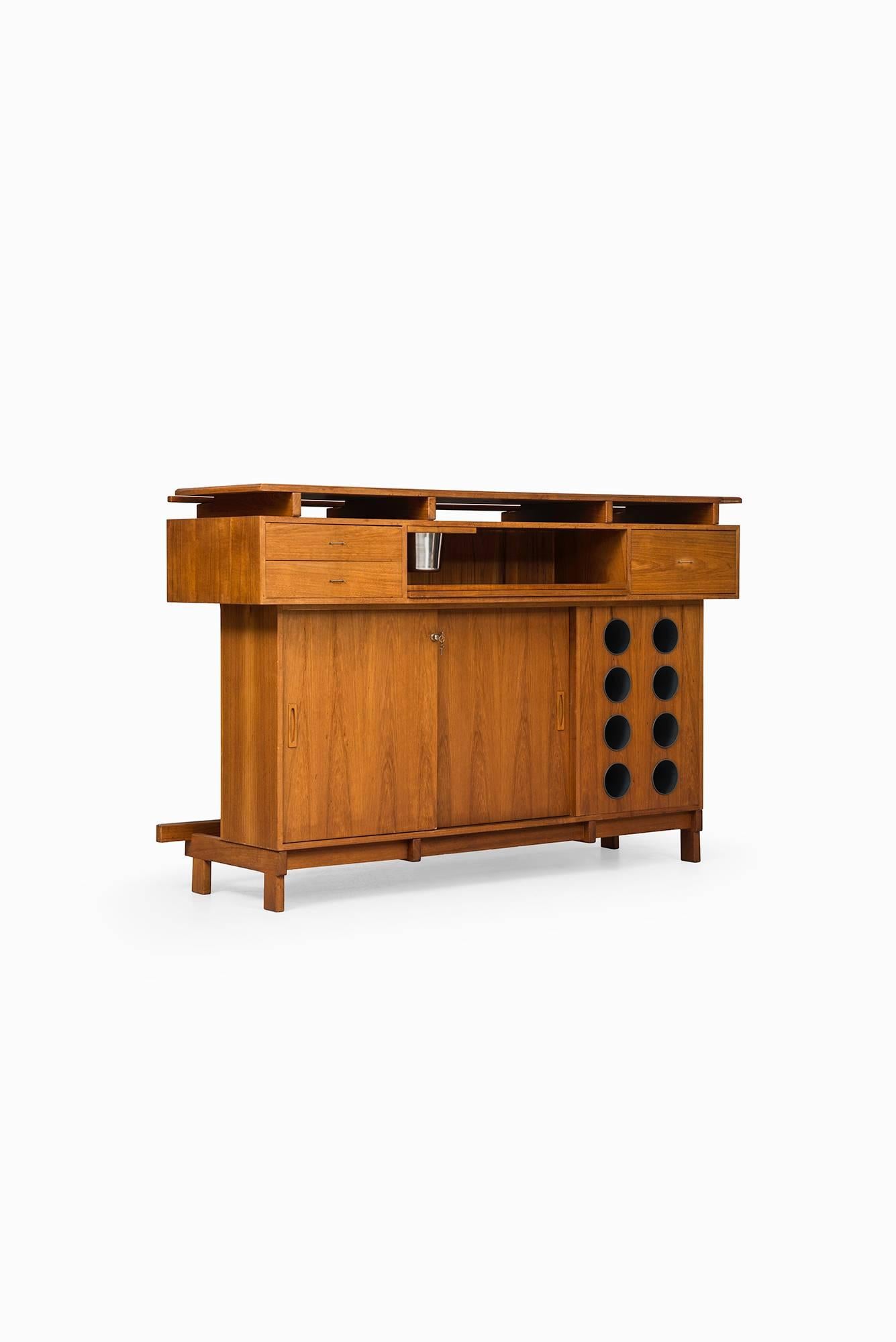 Rare large bar cabinet in teak. Produced by Dyrlund in Denmark.