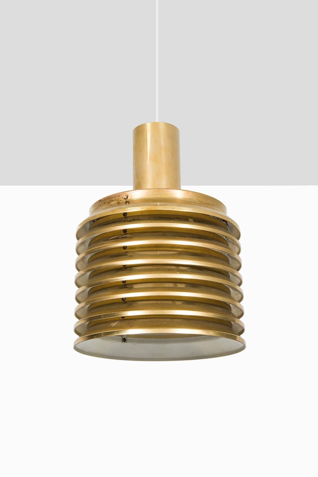 A set of five ceiling lamps model T-642 designed by Hans-Agne Jakobsson. Produced by Hans-Agne Jakobsson in Markaryd, Sweden.
