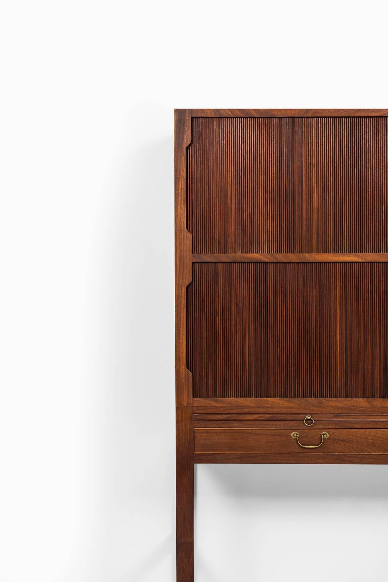 Rare cabinet designed by Ole Wanscher. Produced by A.J. Iversen in Denmark.
