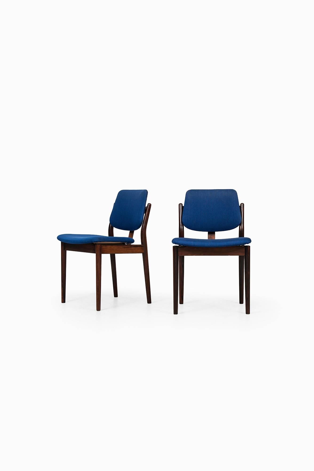 Rare set of eight dining chairs designed by Arne Vodder. Produced by Sibast Møbelfabrik in Denmark.