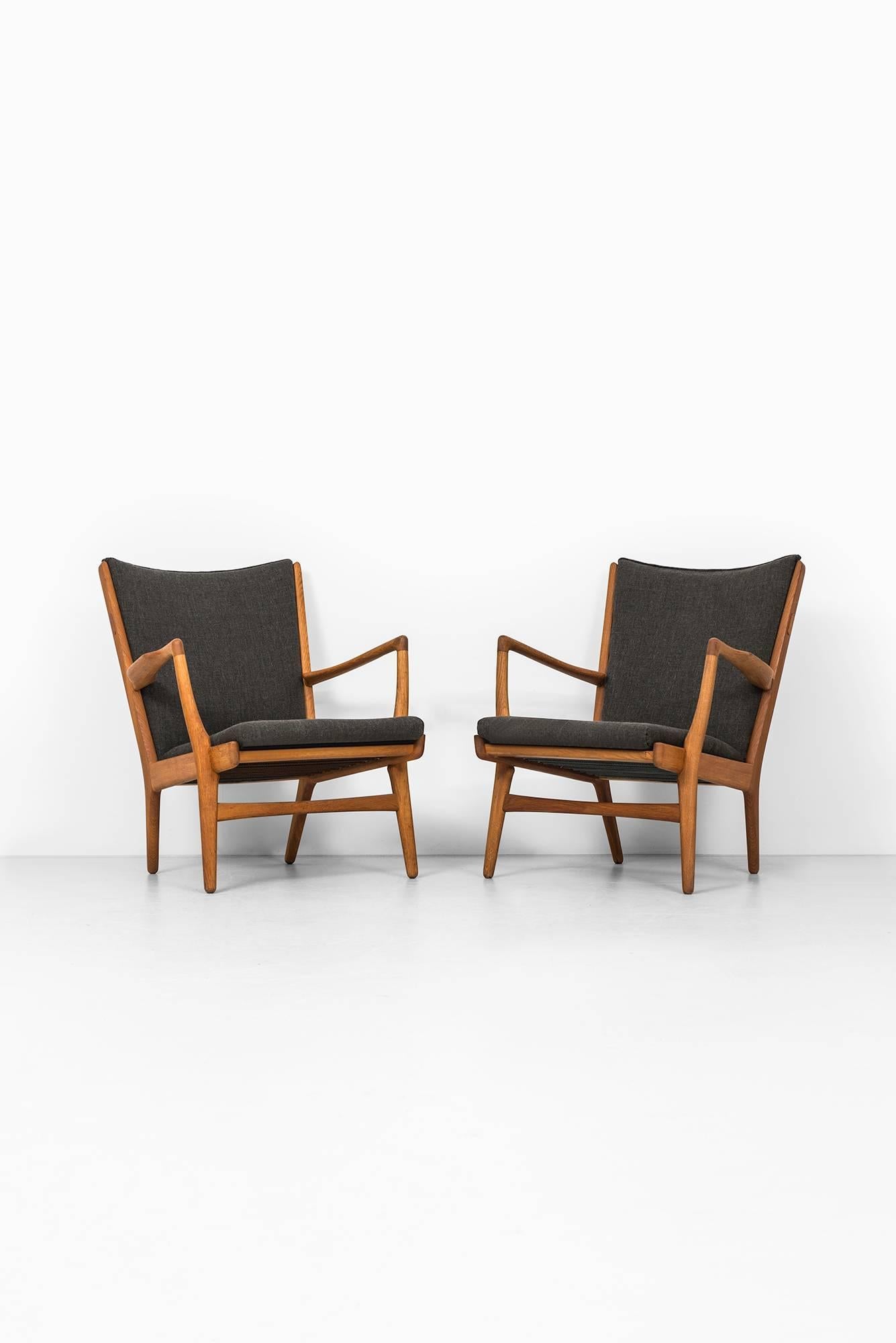 Rare pair of easy chairs model AP-16 designed by Hans Wegner. Produced by AP-Stolen in Denmark.