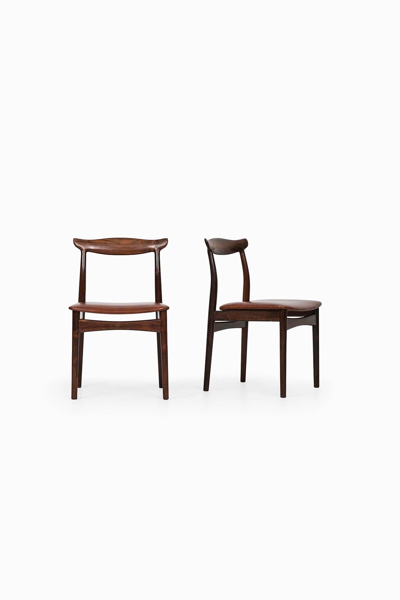 Rare set of six dining chairs model 112 designed by Erik Wørts. Produced by Vamo Sønderborg in Denmark. Reupholstered in new leather.