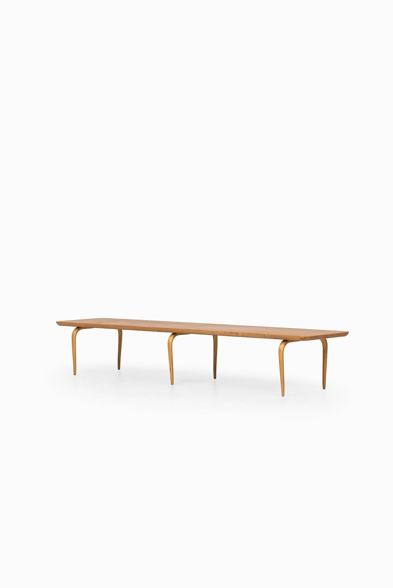 Rare low bench or side table designed by Bruno Mathsson. Produced by Karl Mathsson in Värnamo, Sweden.