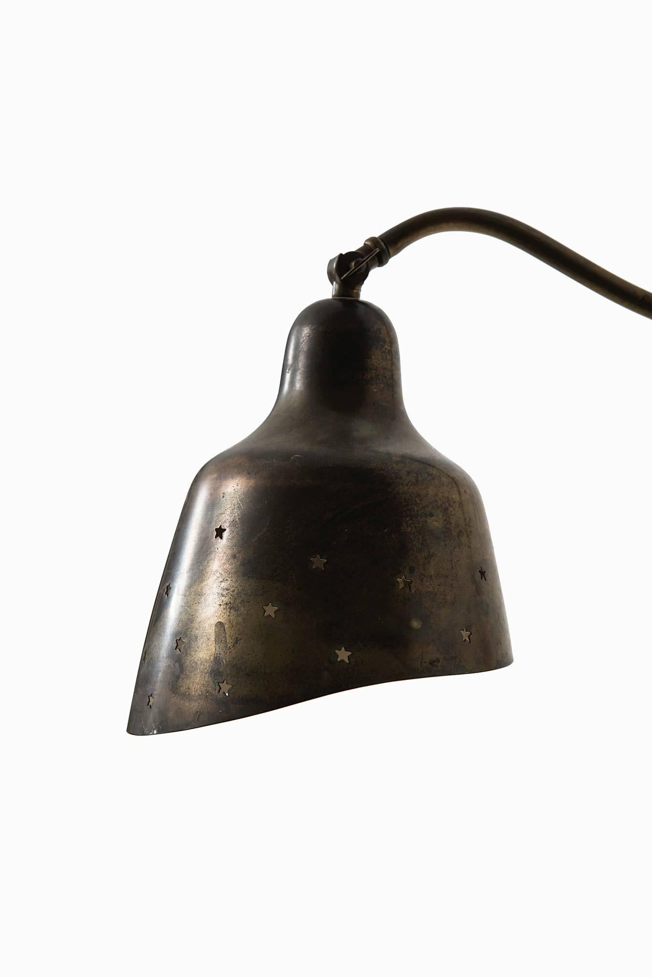 Rare wall lamp in the manner of Vilhelm Lauritzen. Produced in Denmark.