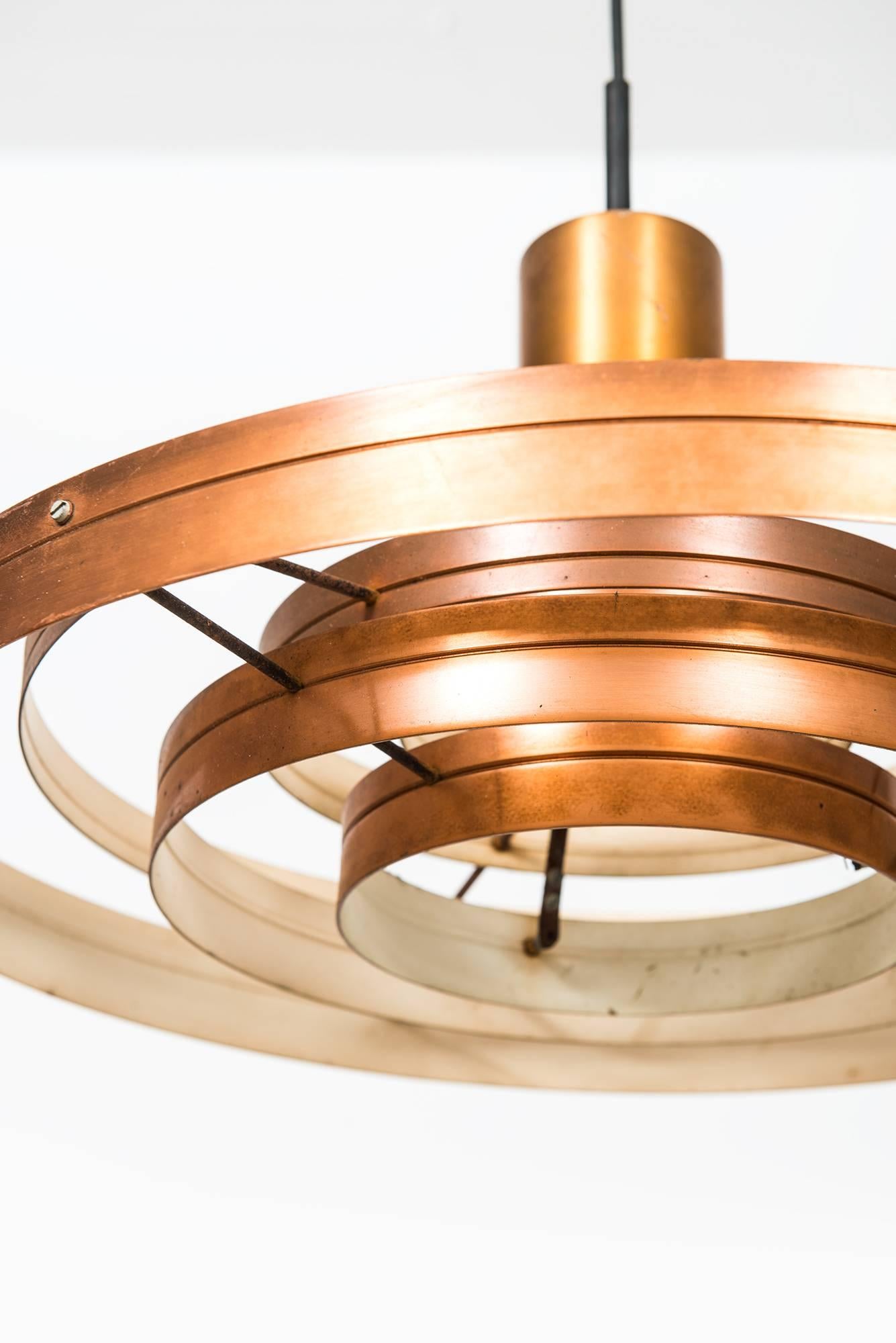 A pair of ceiling lamps model Fibonacci designed by Sophus Frandsen. Produced by Fog & Mørup in Denmark.