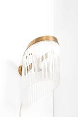 Rare Art Deco wall lamp in brass and glass