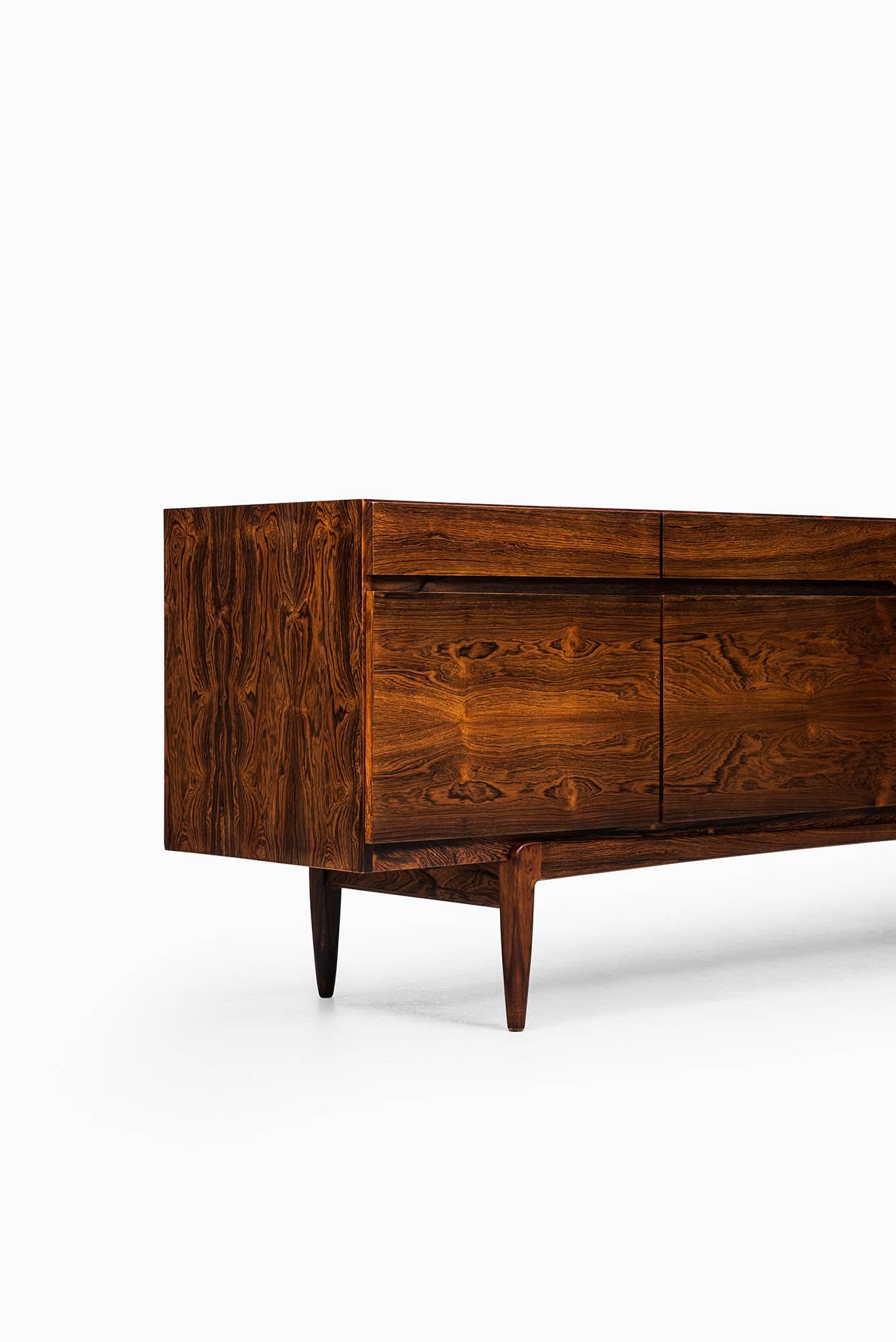 Rare freestanding sideboard model FA-66 designed by Ib Kofod-Larsen. Produced by Faarup Møbelfabrik in Denmark.