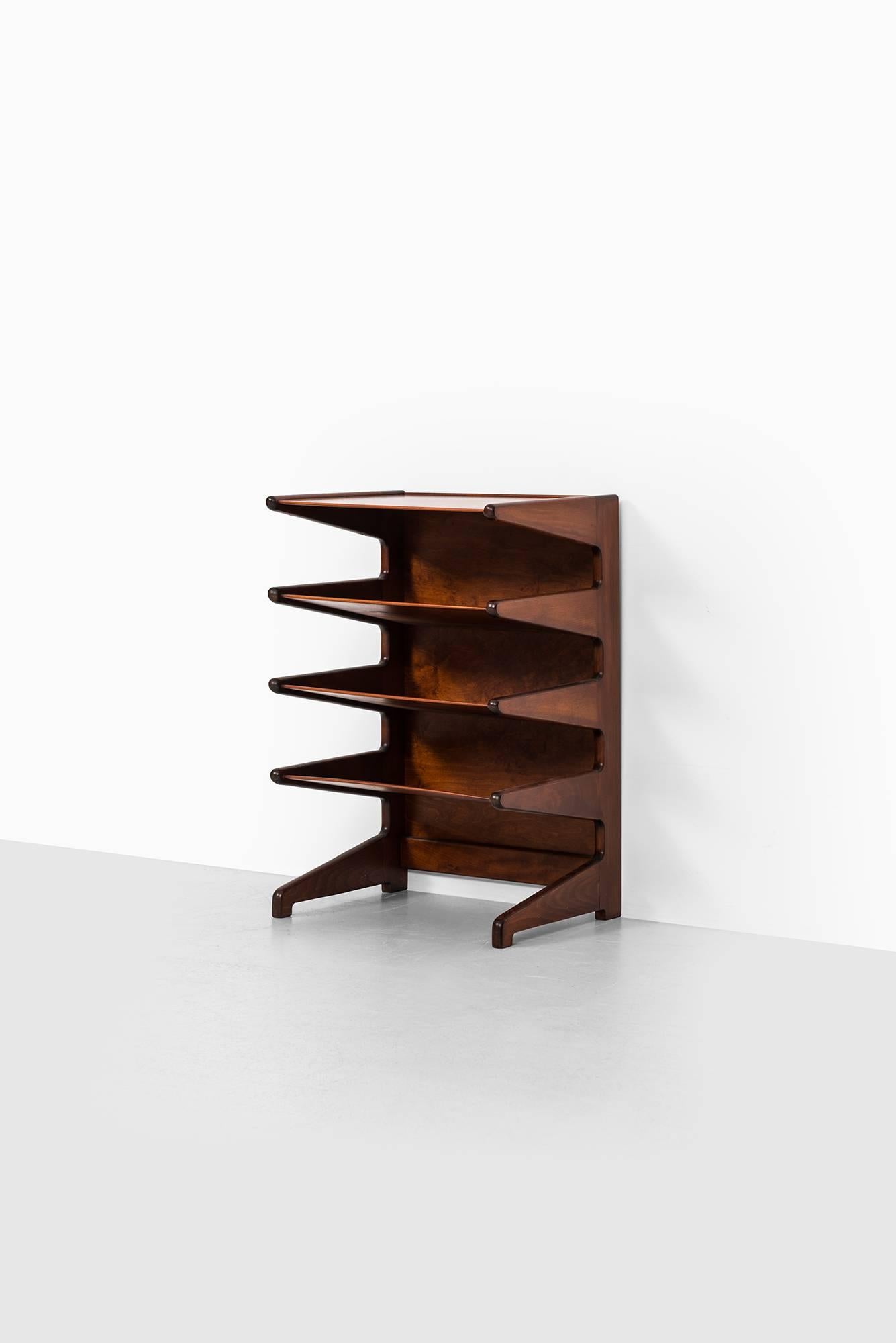 Rare magazine rack model Futura designed by David Rosén. Produced by Nordiska Kompaniet in Sweden.