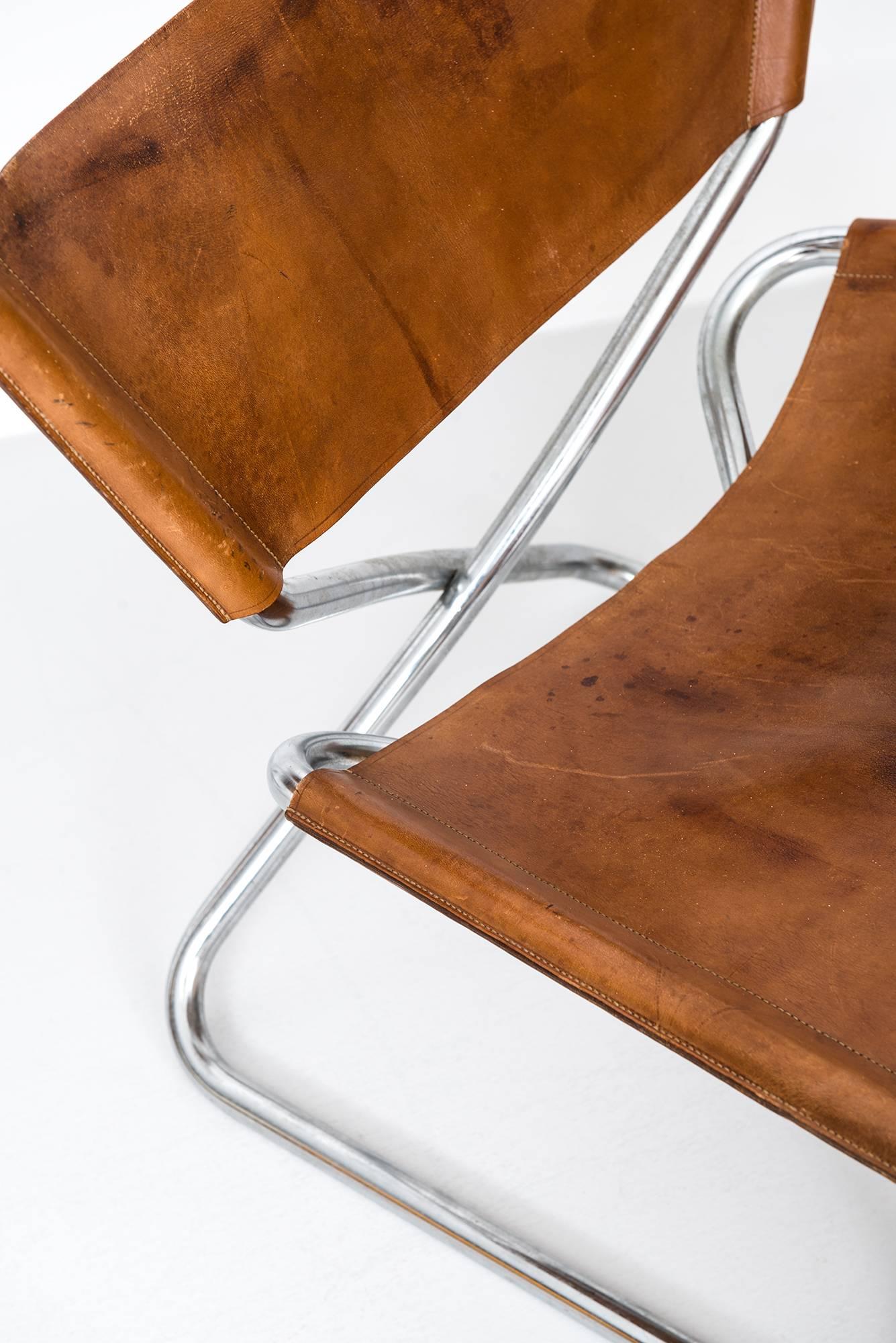 Rare pair of Z easy chairs designed by Erik Magnussen. Produced by Torben Ørskov in Denmark.