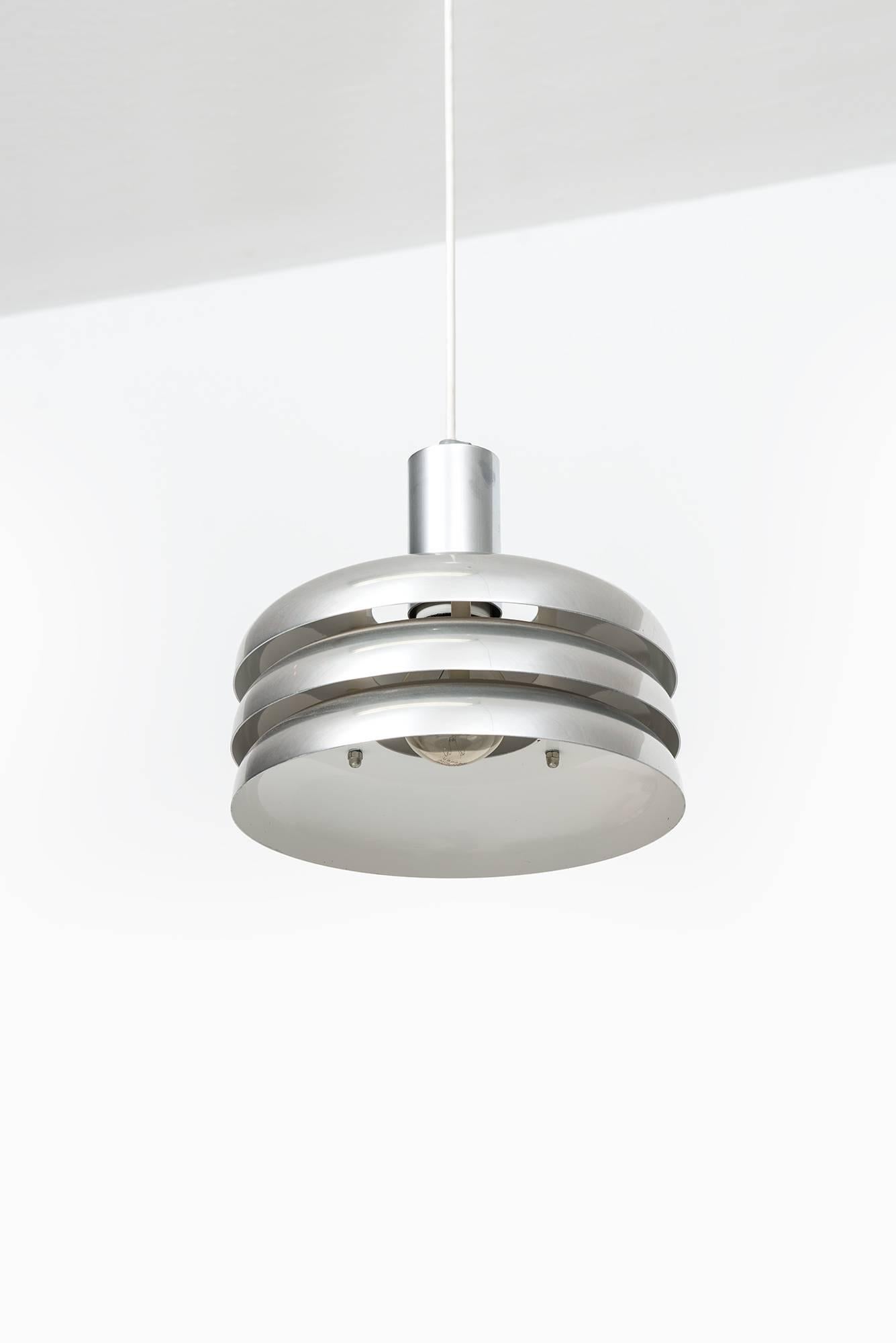 A set of three ceiling lamps model T-724 / ‘Lamingo’ designed by Hans-Agne Jakobsson. Produced by Hans-Agne Jakobsson AB in Markaryd, Sweden.
