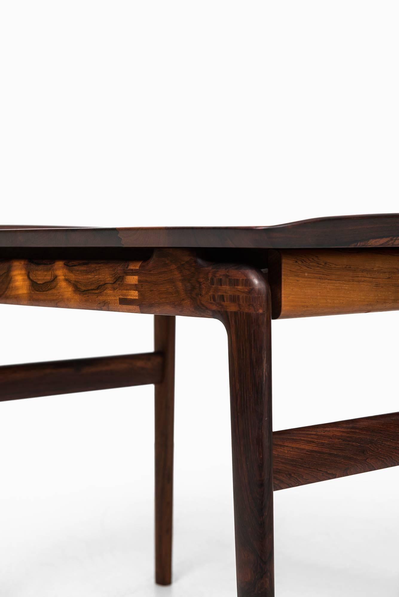 Rare pair of side or bedside tables designed by Peter Hvidt & Orla Mølgaard-Nielsen. Produced by France & Son in Denmark.