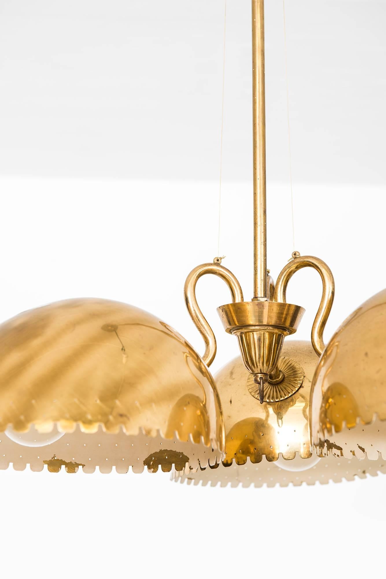 Rare ceiling lamp designed by Carl-Axel Acking. Produced by Bröderna Malmströms Metallvarufabrik in Sweden.