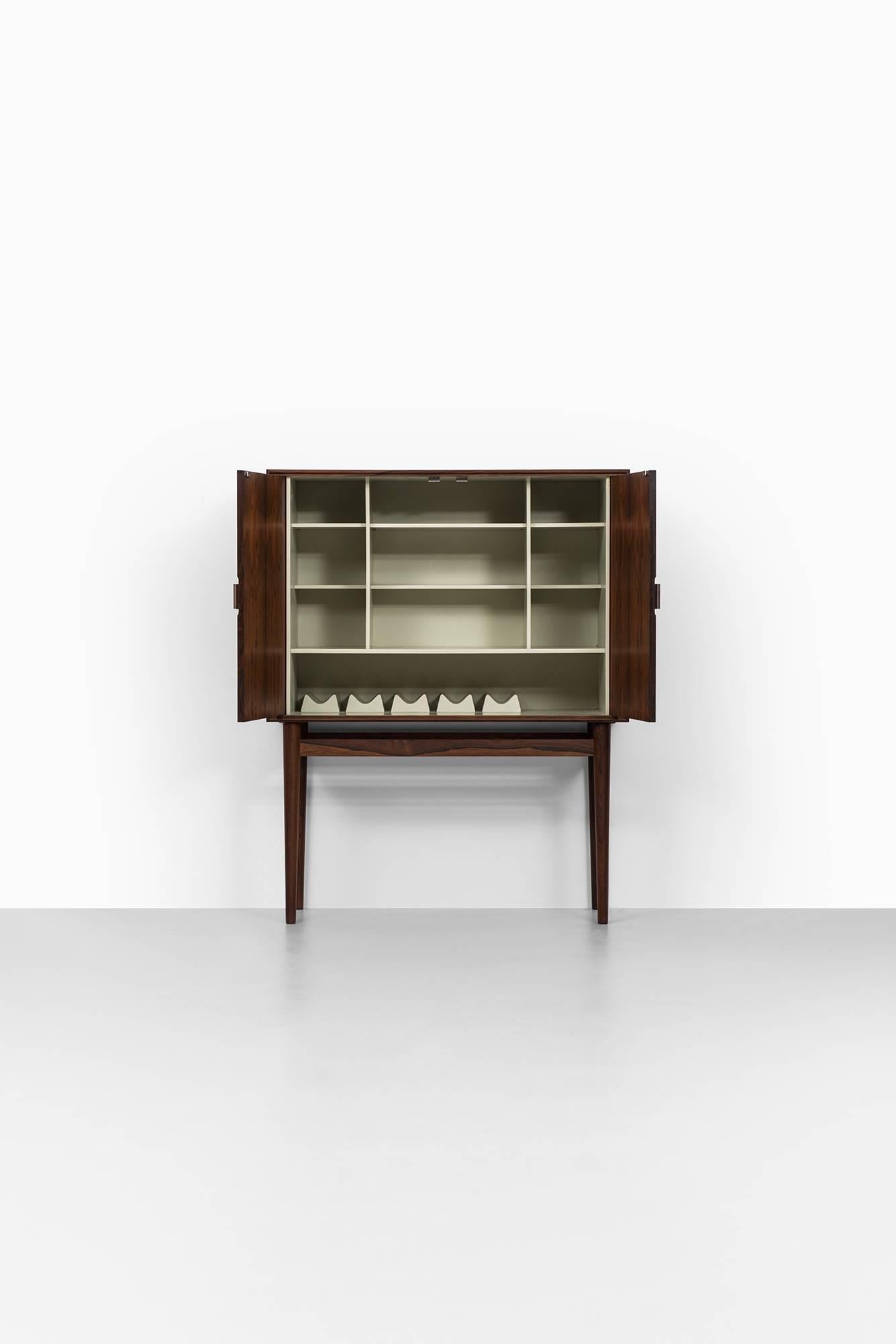 Rare bar cabinet model 63 designed by Helge Vestergaard Jensen. Produced by Jason Møbler in Denmark.