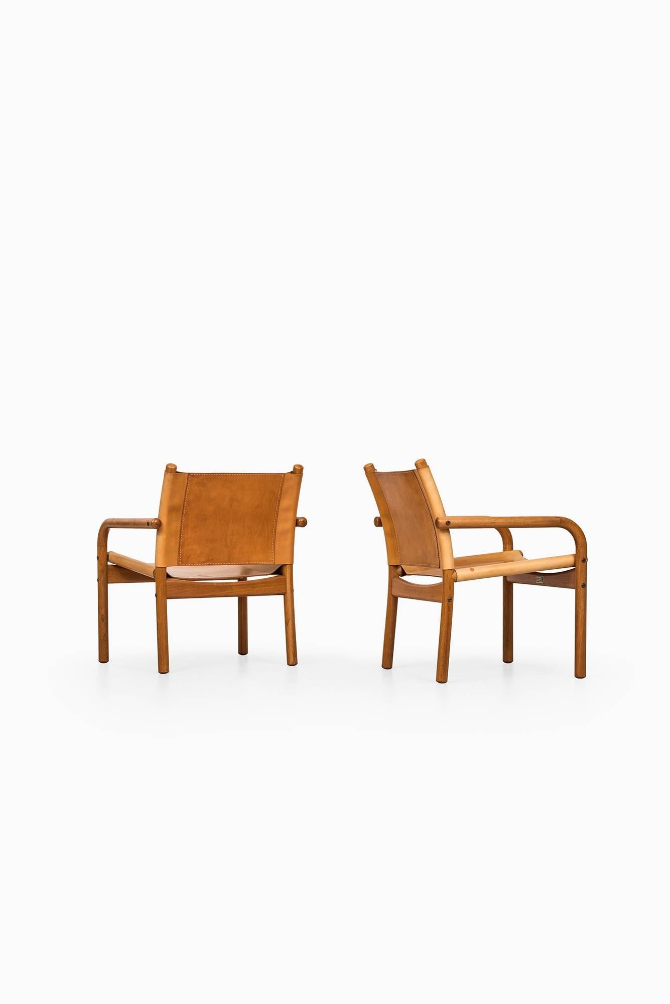 Scandinavian Modern Easy Chairs in Oak and Cognac Brown Leather by Bernstorffsminde Møbelfabrik