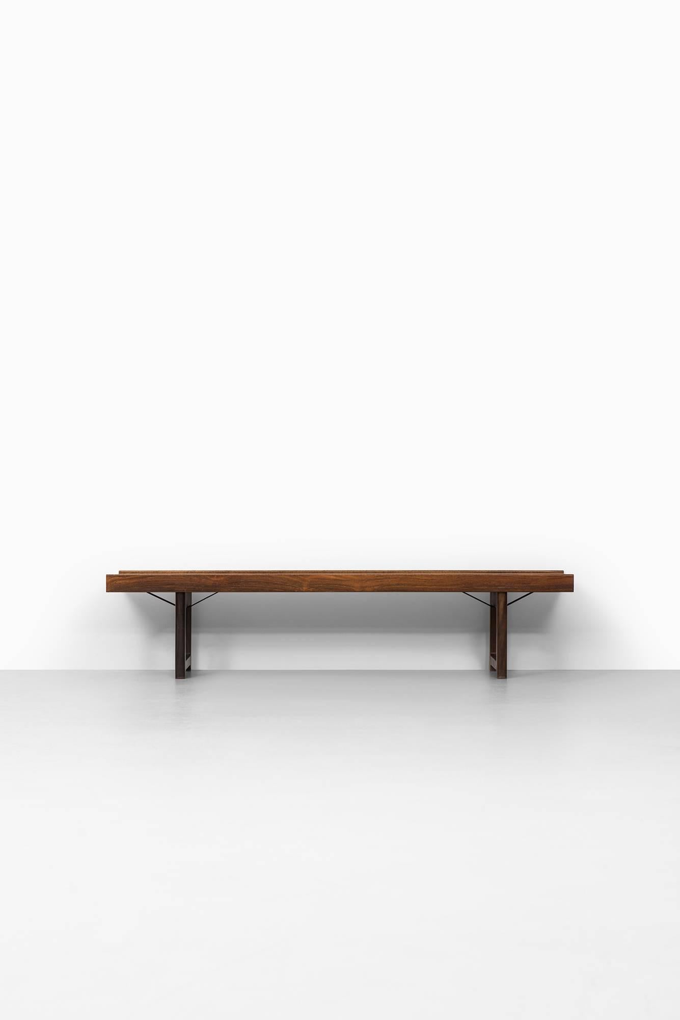 Bench or side table model Krobo designed by Torbjørn Afdal. Produced by Bruksbo in Norway.