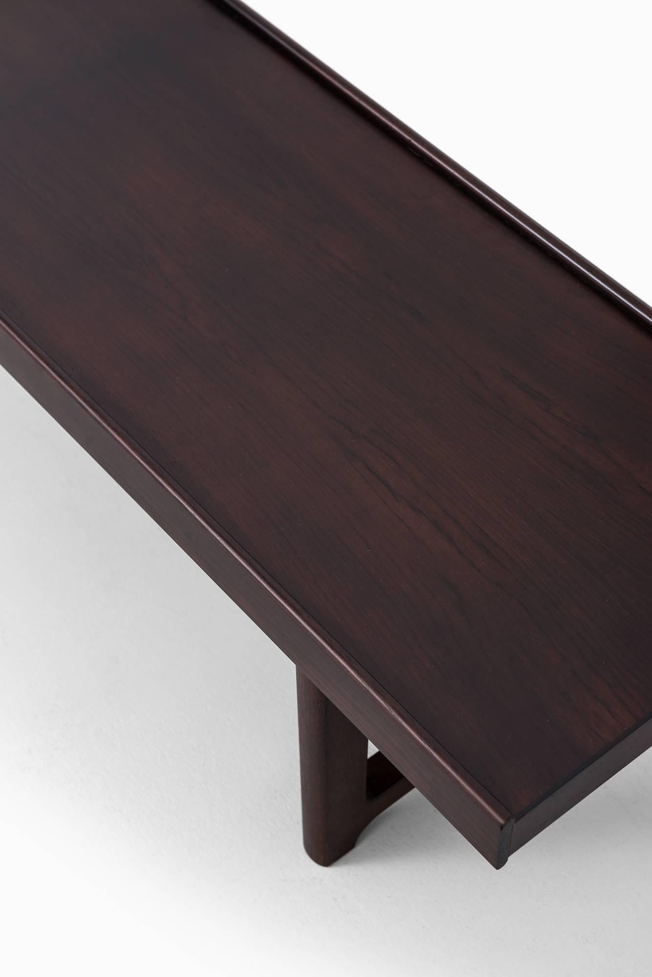 Bench/side table model Krobo designed by Torbjørn Afdal. Produced by Bruksbo in Norway.