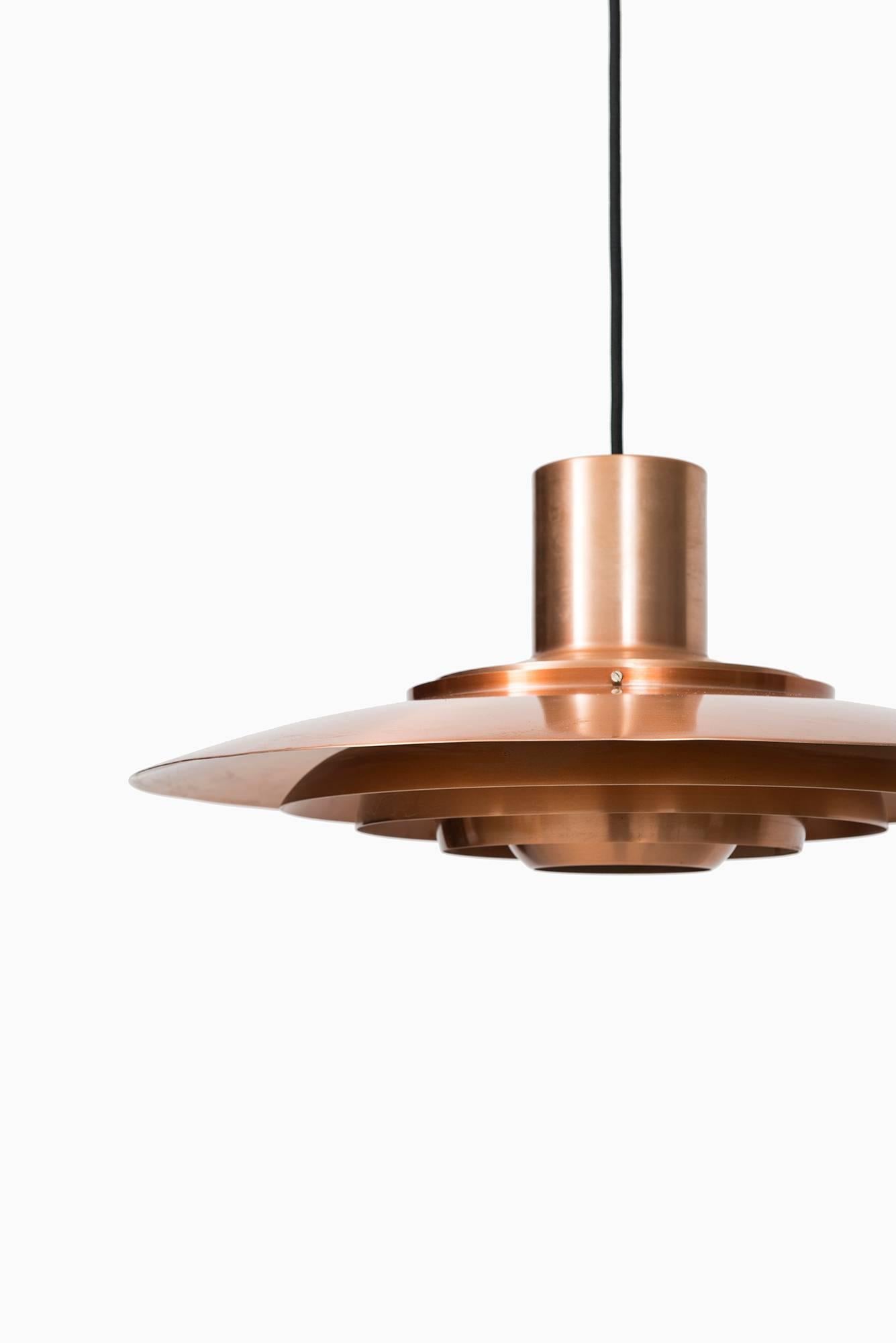 Rare ceiling lamp in copper designed by Preben Fabricius & Jørgen Kastholm. Produced by Nordisk Solar in Denmark.