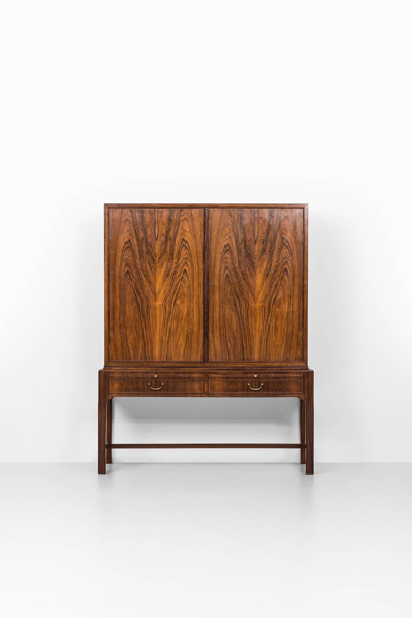 Very rare master cabinet attributed to Kaare Klint. Produced by cabinetmaker C.B Hansen in Denmark.