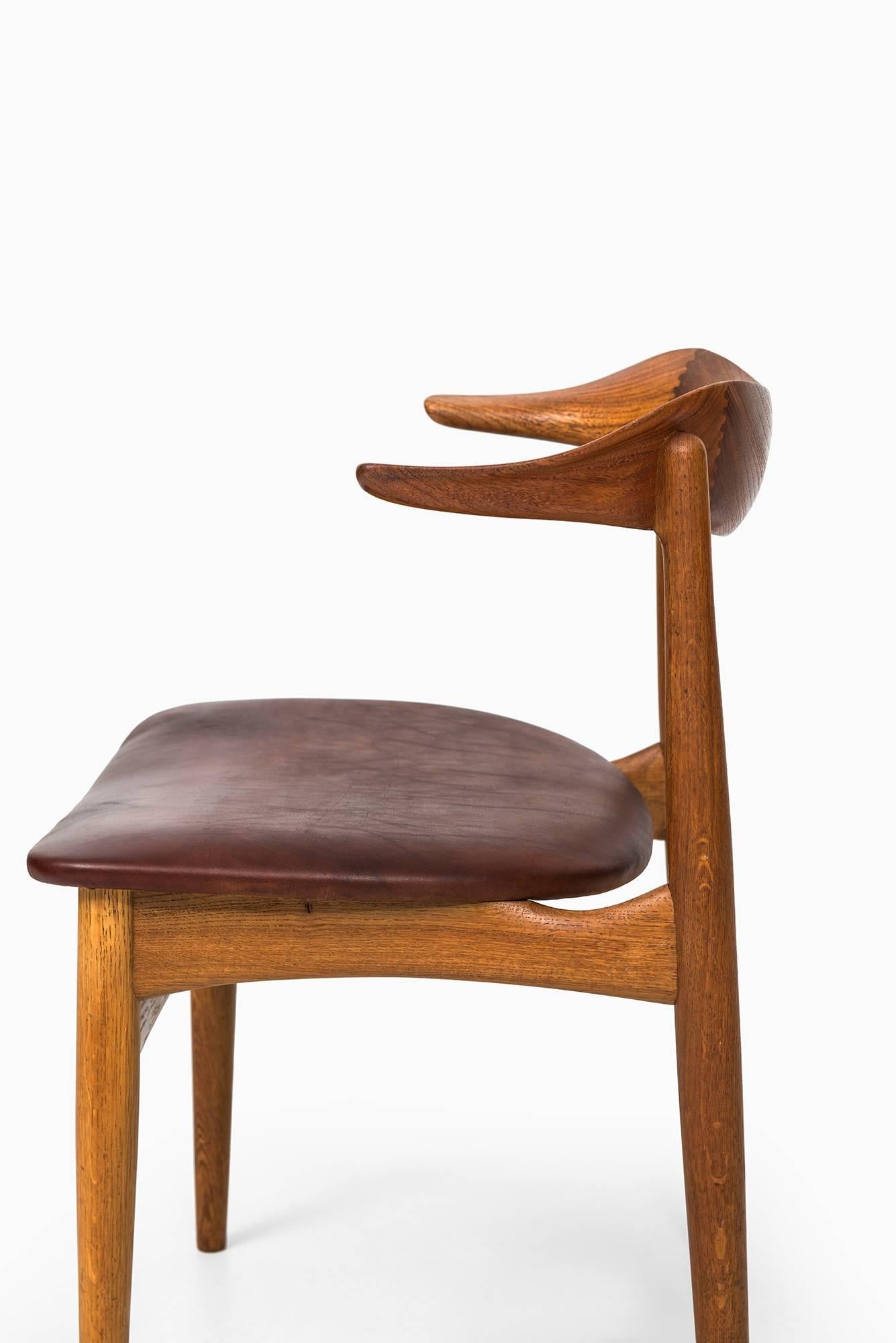 Rare chair model SM 521/cowhorn chair designed by Knud Færch. Produced by Slagelse møbelfabrik in Denmark.
