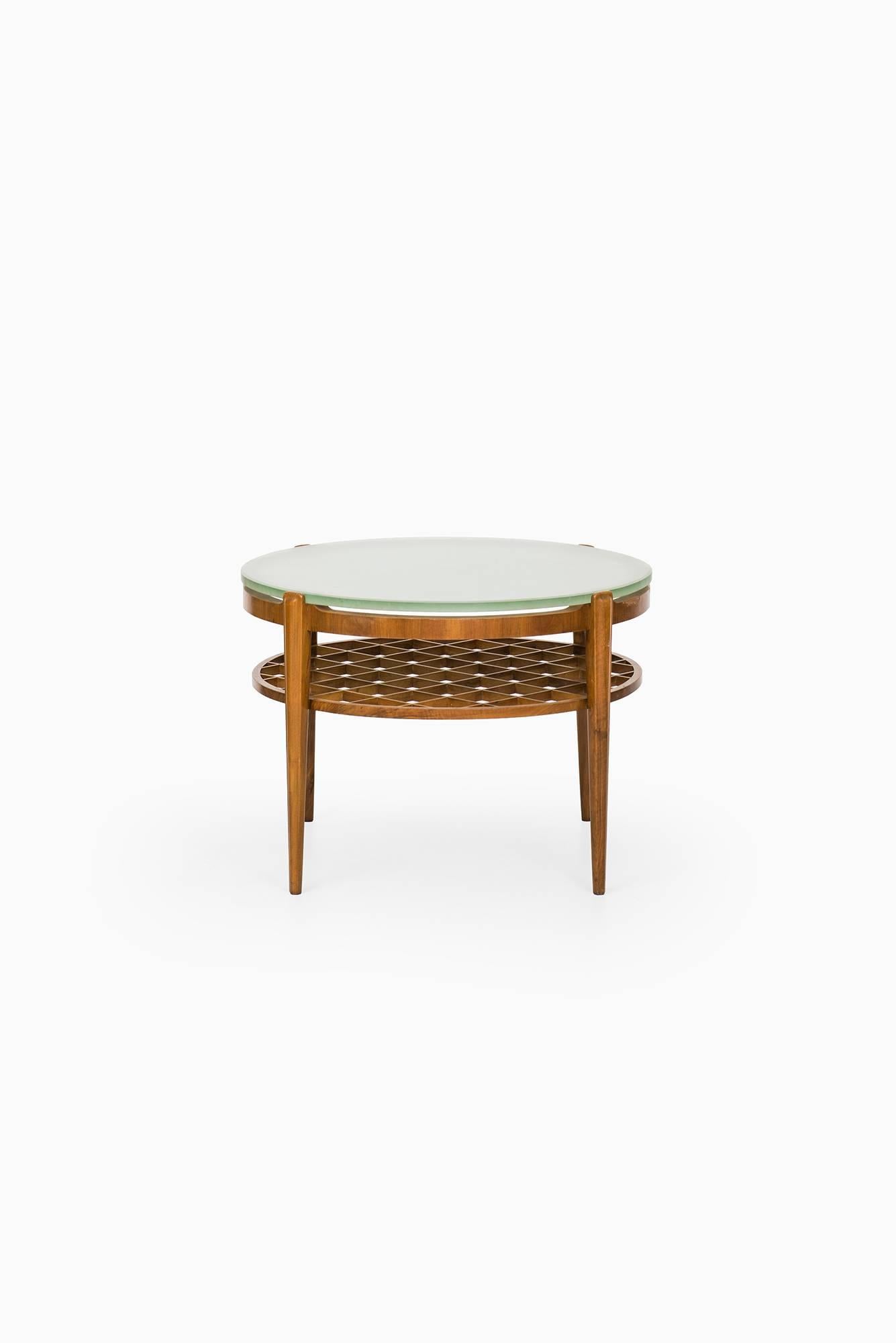 Rare coffee / side table attributed to Carl-Axel Acking. Produced by Bodafors in Sweden.