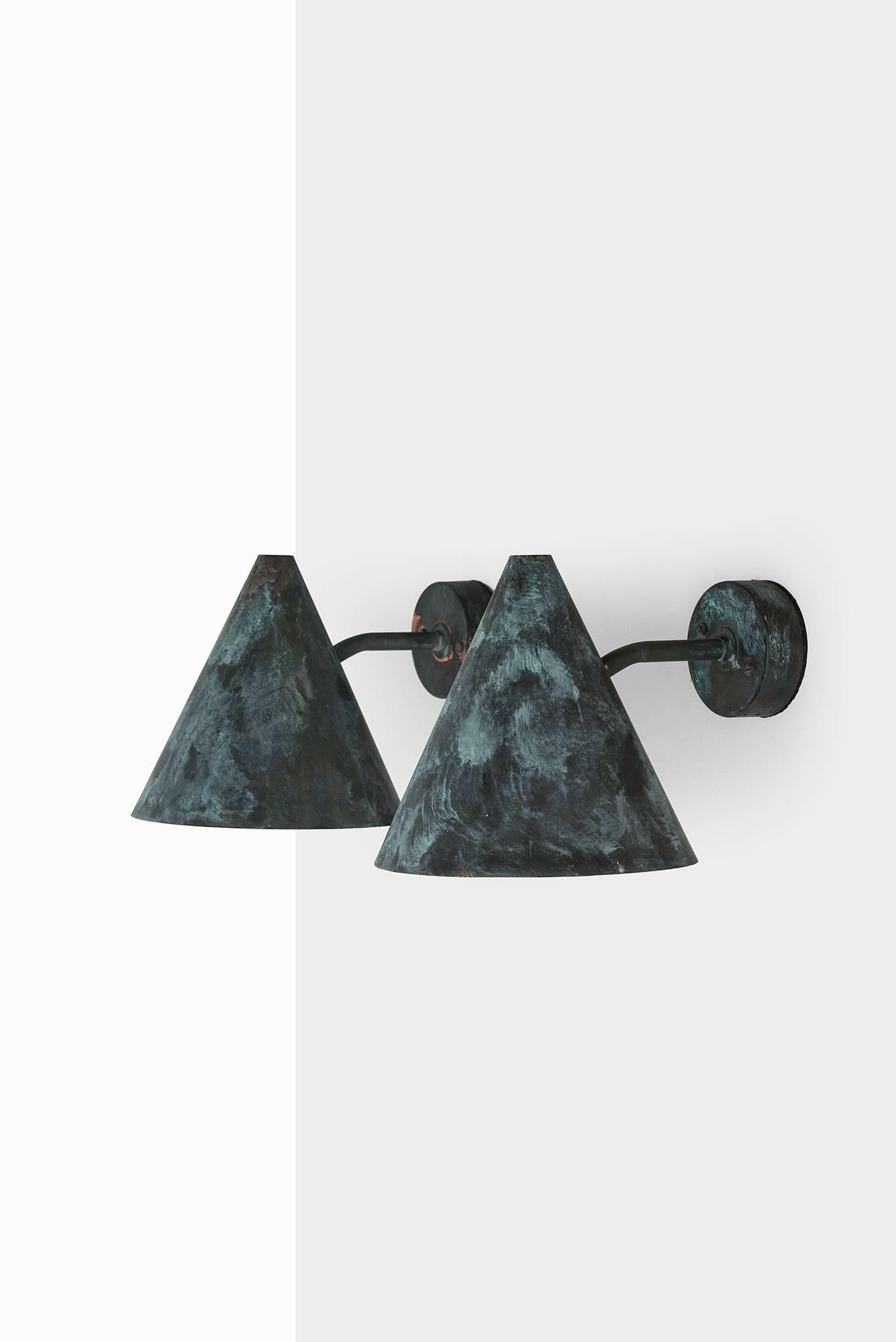 Outdoor pair of wall lamps model Tratten designed by Hans-Agne Jakobsson. Produced by Hans-Agne Jakobsson AB in Markaryd, Sweden.