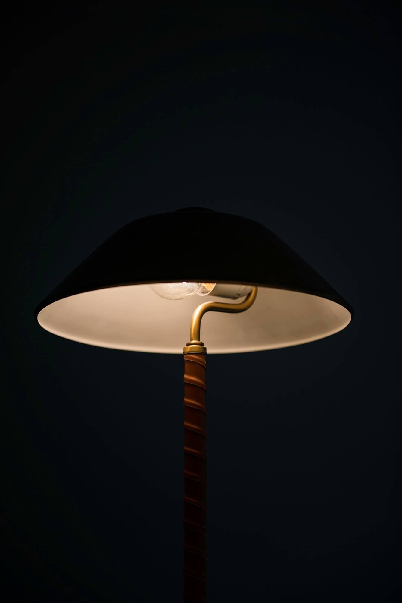 Mid-20th Century Table Lamp in Brass and Leather Produced by Einar Bäckström in Sweden