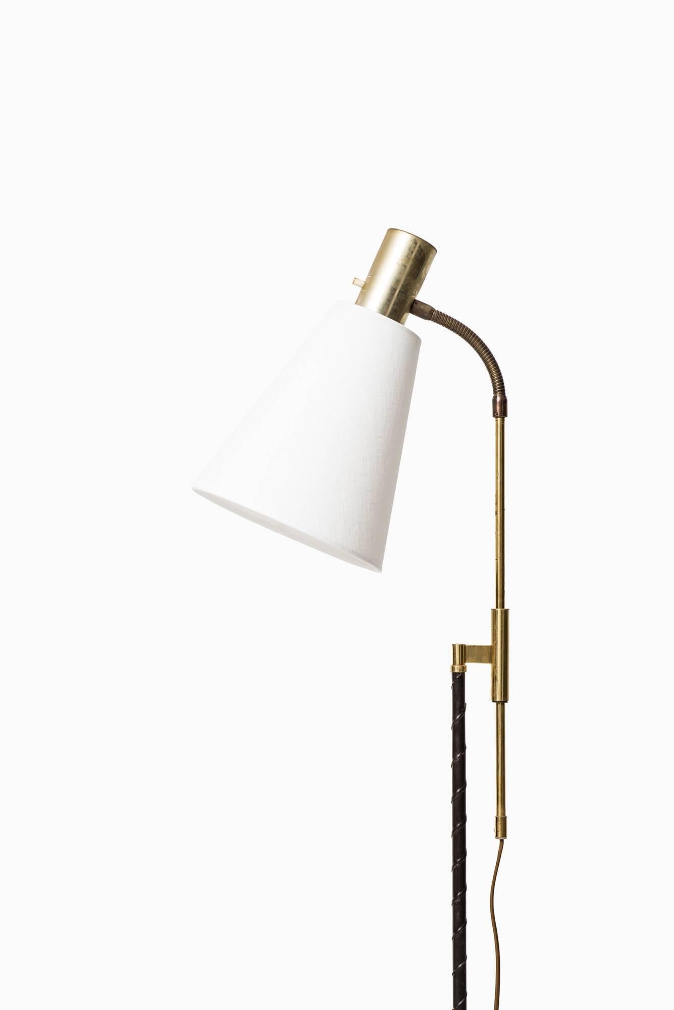 Height adjustable floor lamp. Produced by Falkenbergs Belysnings in Sweden.