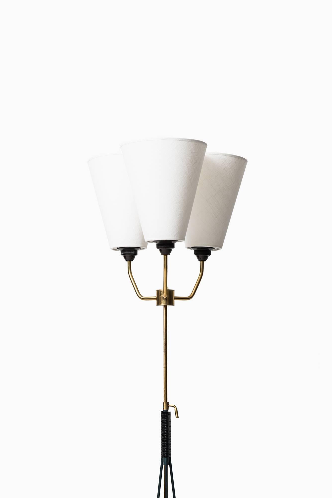 Height adjustable uplight or floor lamp. Produced in Sweden.