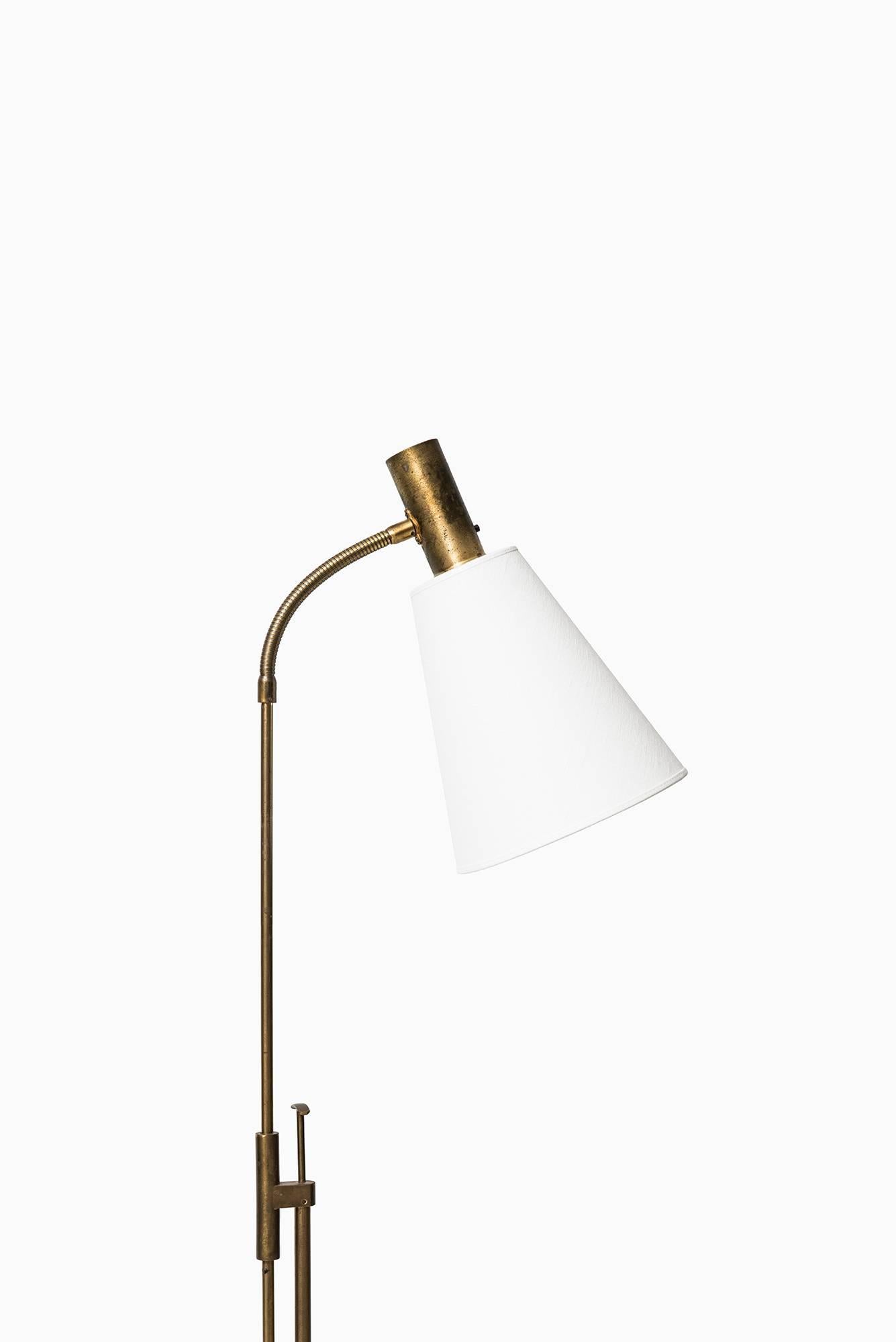 Height adjustable floor lamp. Produced by Falkenbergs Belysnings in Sweden.