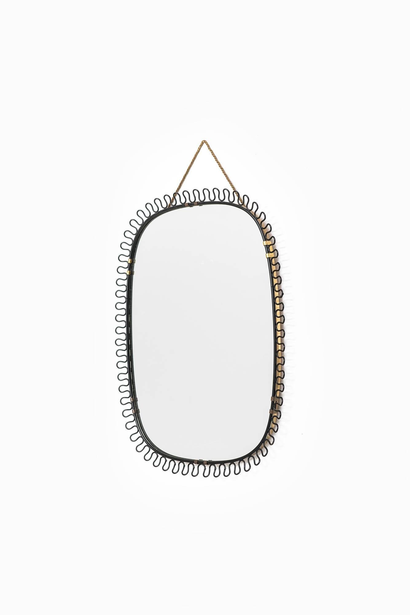 Mirror designed by Josef Frank. Produced by Svenskt Tenn in Sweden.
